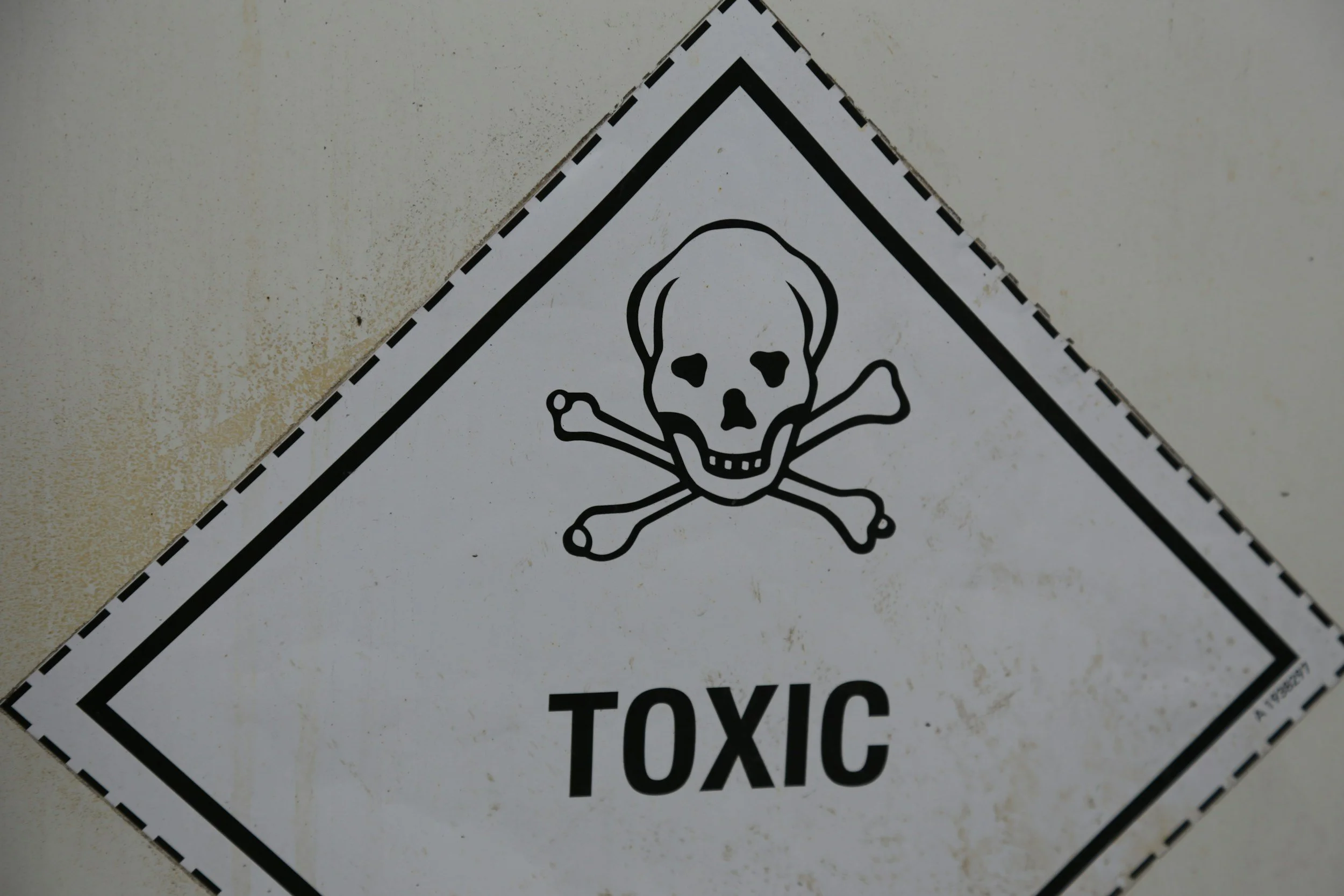 skull and cross bones with the word "toxic" signifying toxic people in a church setting