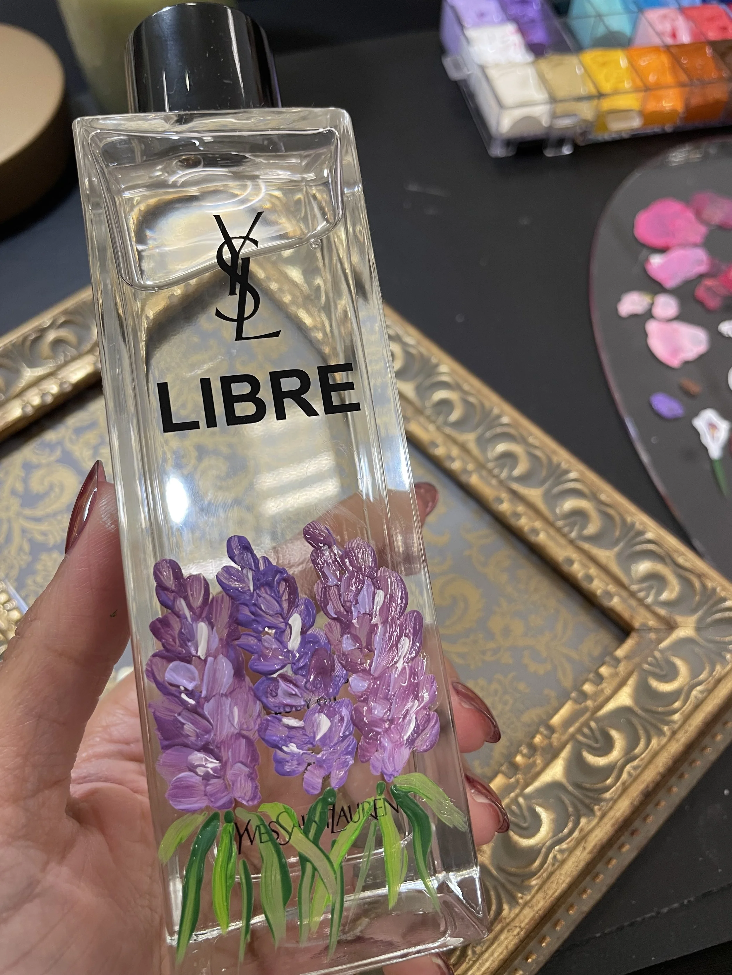 Custom hand-painted floral perfume bottle for a private celebration.