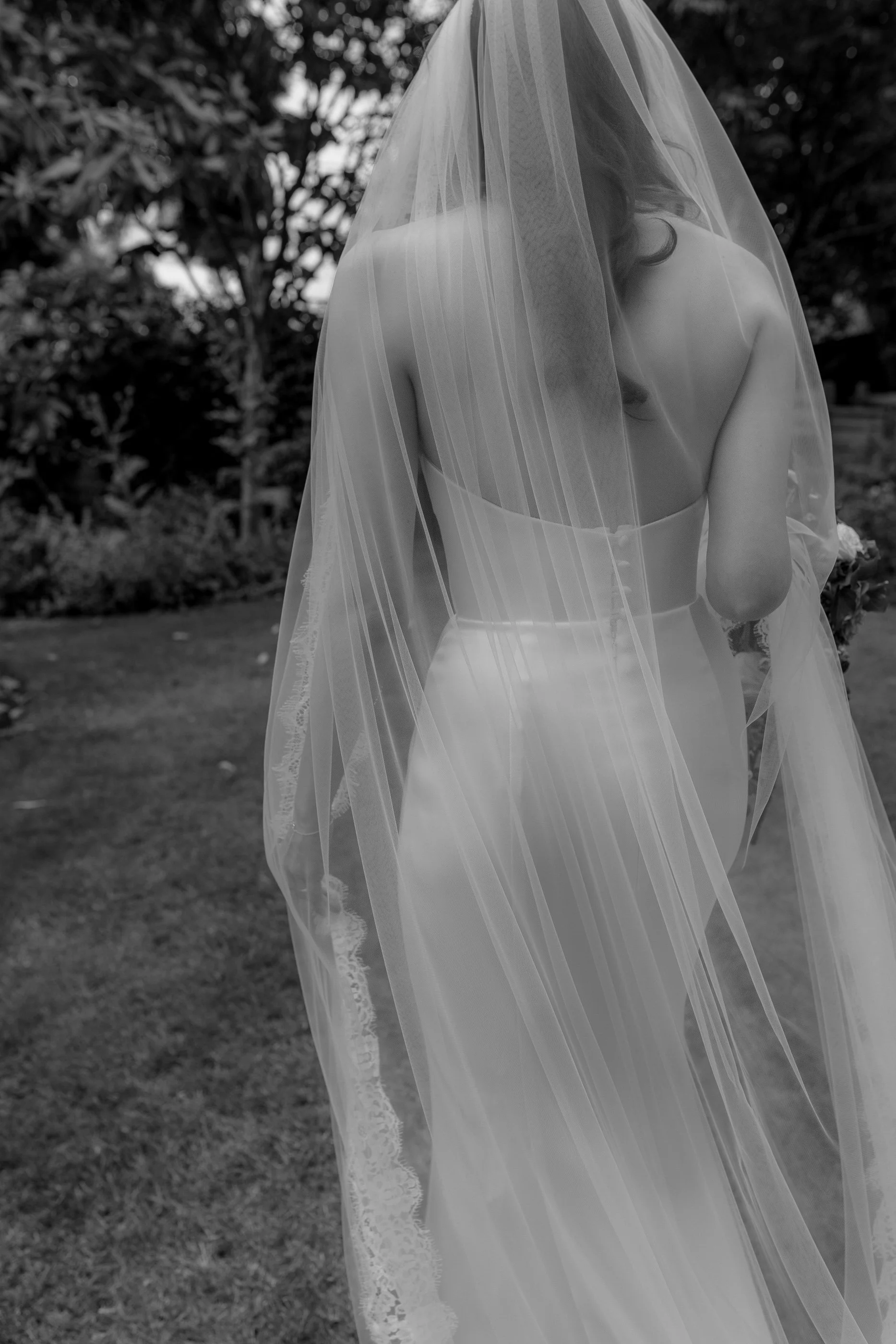 Beautiful-black-and-white-bridal-portrait-of-veil-and-dress-001.jpg
