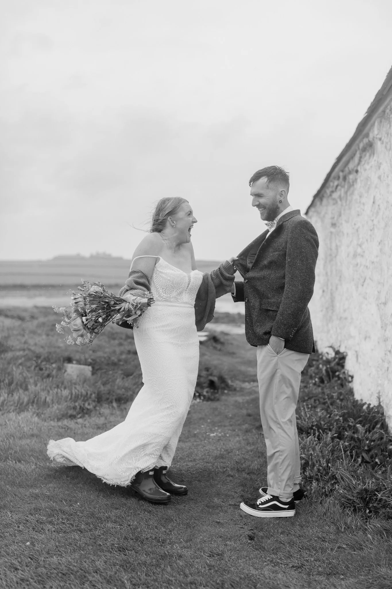 Couple eloping on Anglesey in the rain
