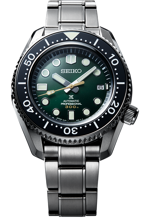 A Seiko automatic professional diver's watch with a green dial, silver bezel, and stainless steel bracelet.