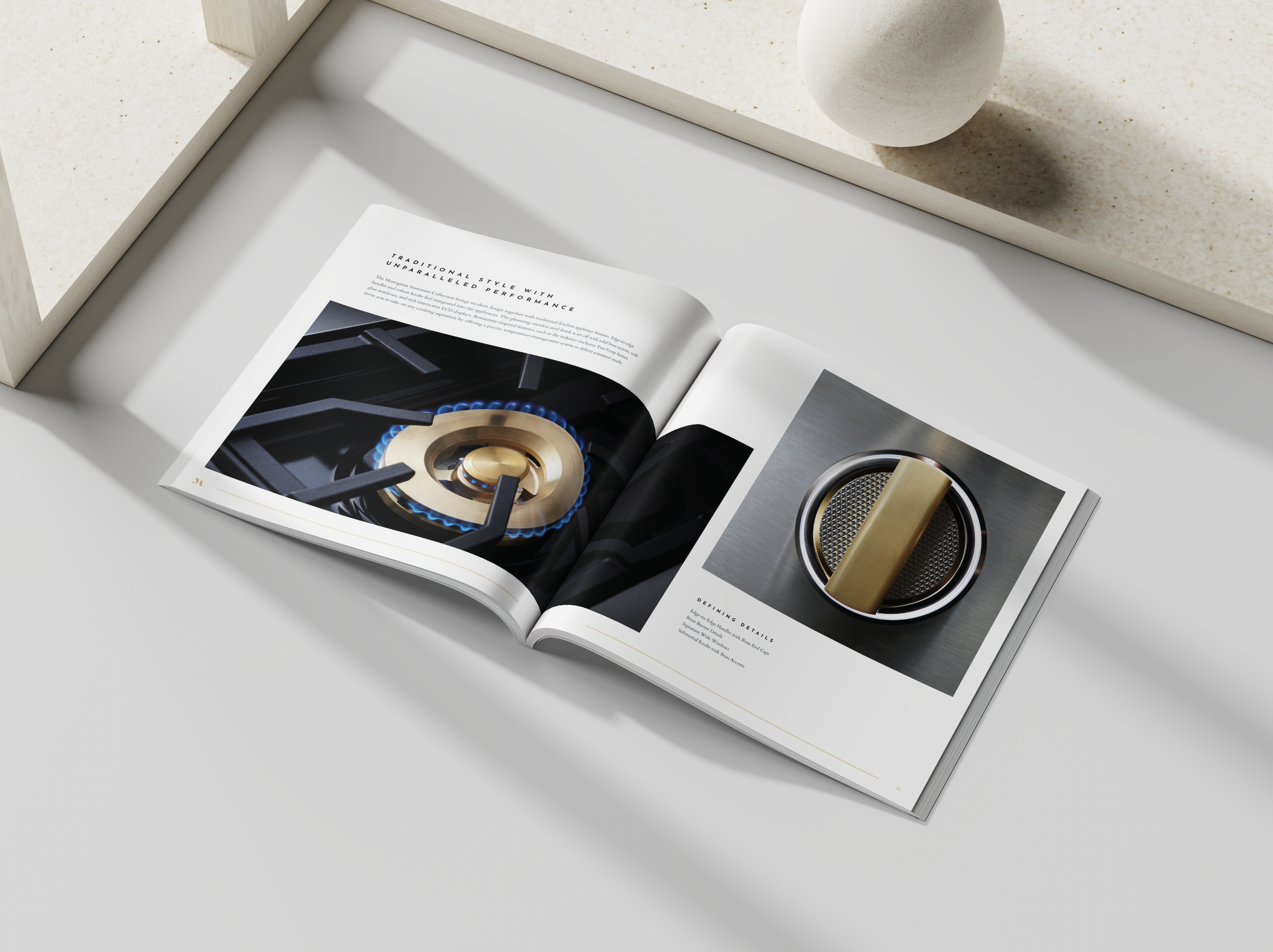Open magazine displaying a close-up photo of a gas stove burner with a blue flame on the left page and a metallic stove part on the right page, on a white table.