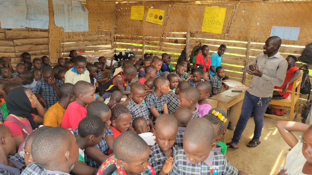 Crowded classroom of Children being taught.jpeg