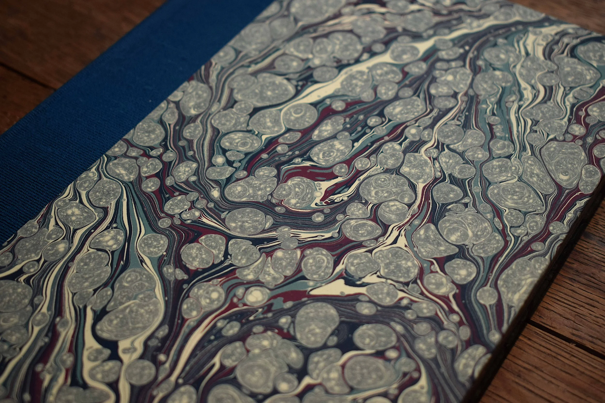 handmade sketchbook with marbled paper, traditional book binding