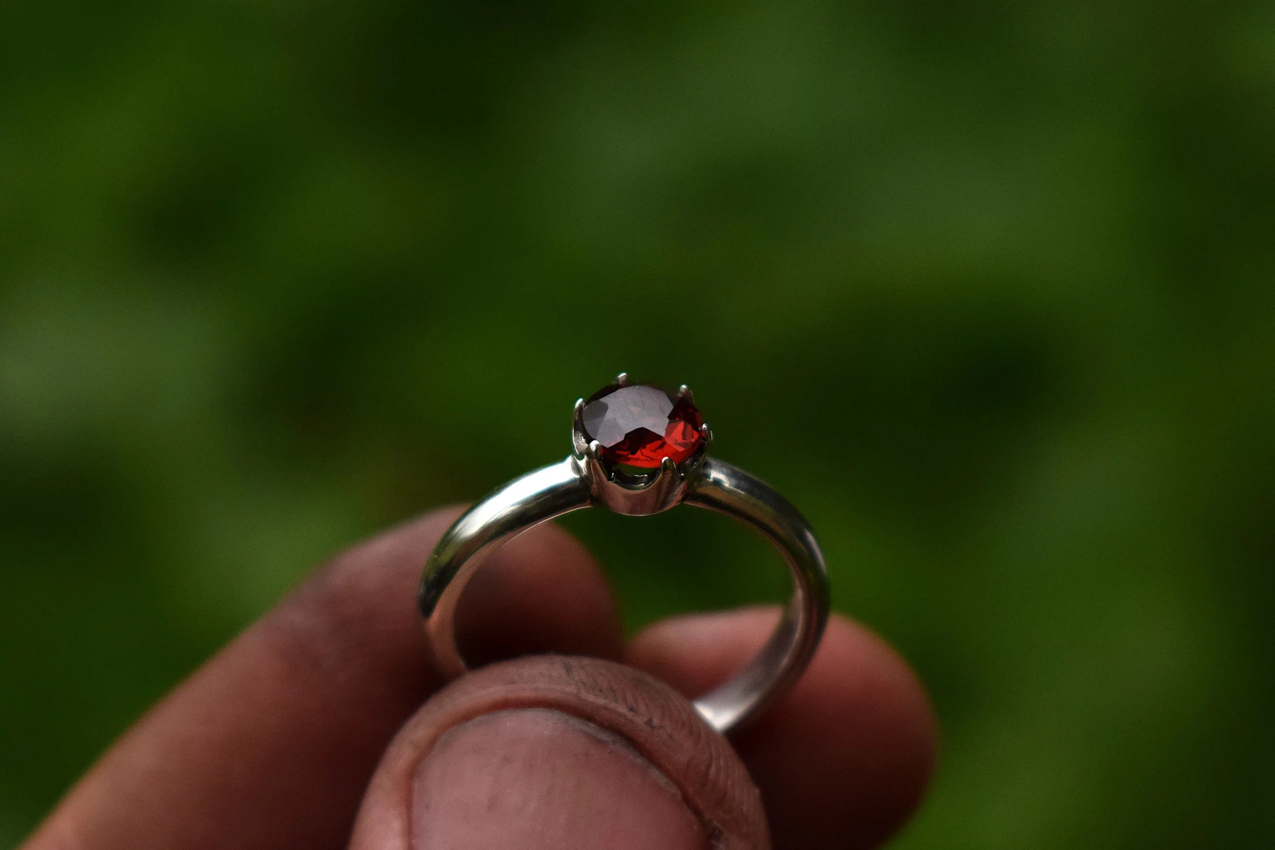 Handmade silver ring with a garnet gemstone