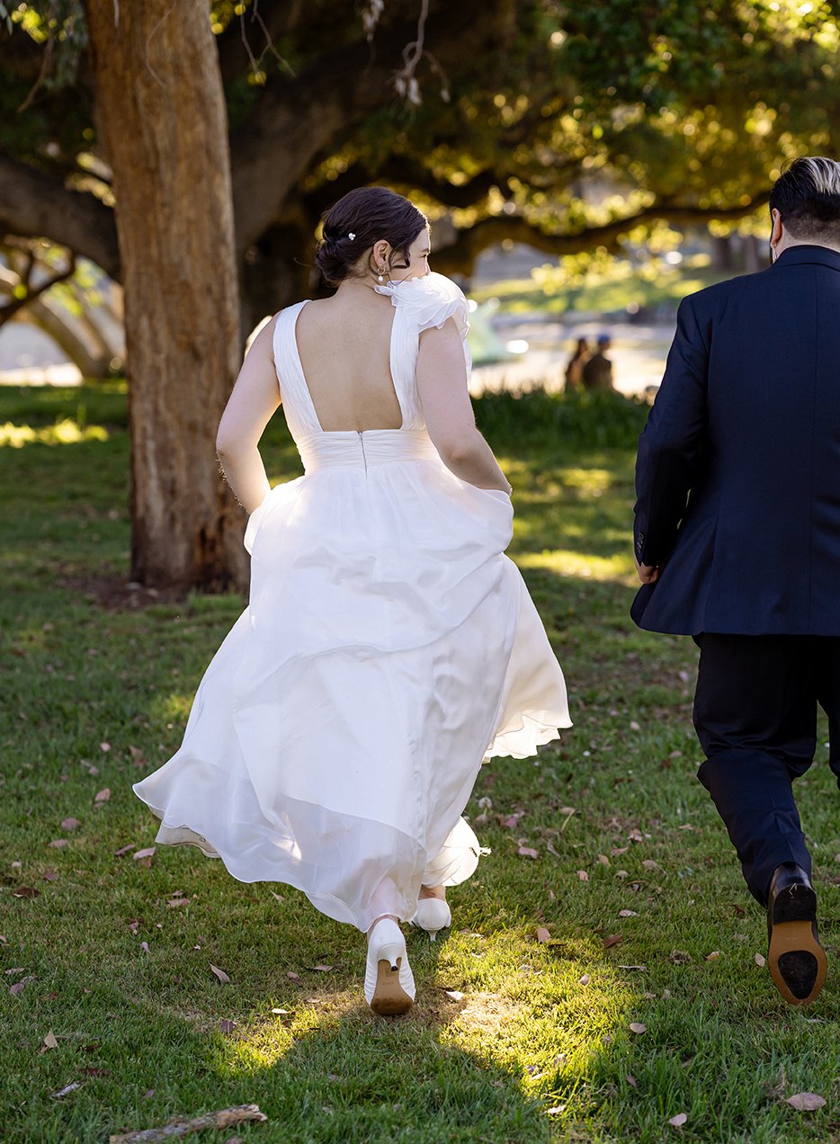 oakland elopement spring couple running.jpg
