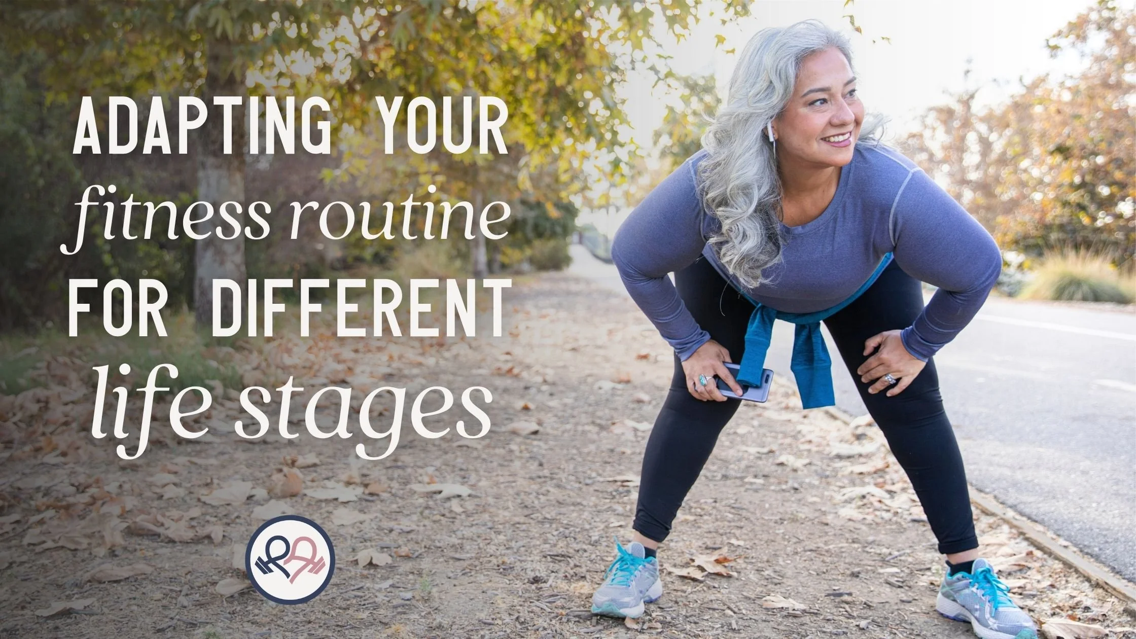 A senior woman in workout cloths takes a break from her walk to stretch her back and hamstrings