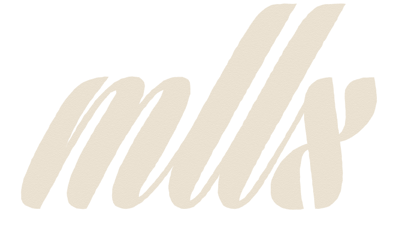 Bold, cursive text spelling 'milk' on a black background.