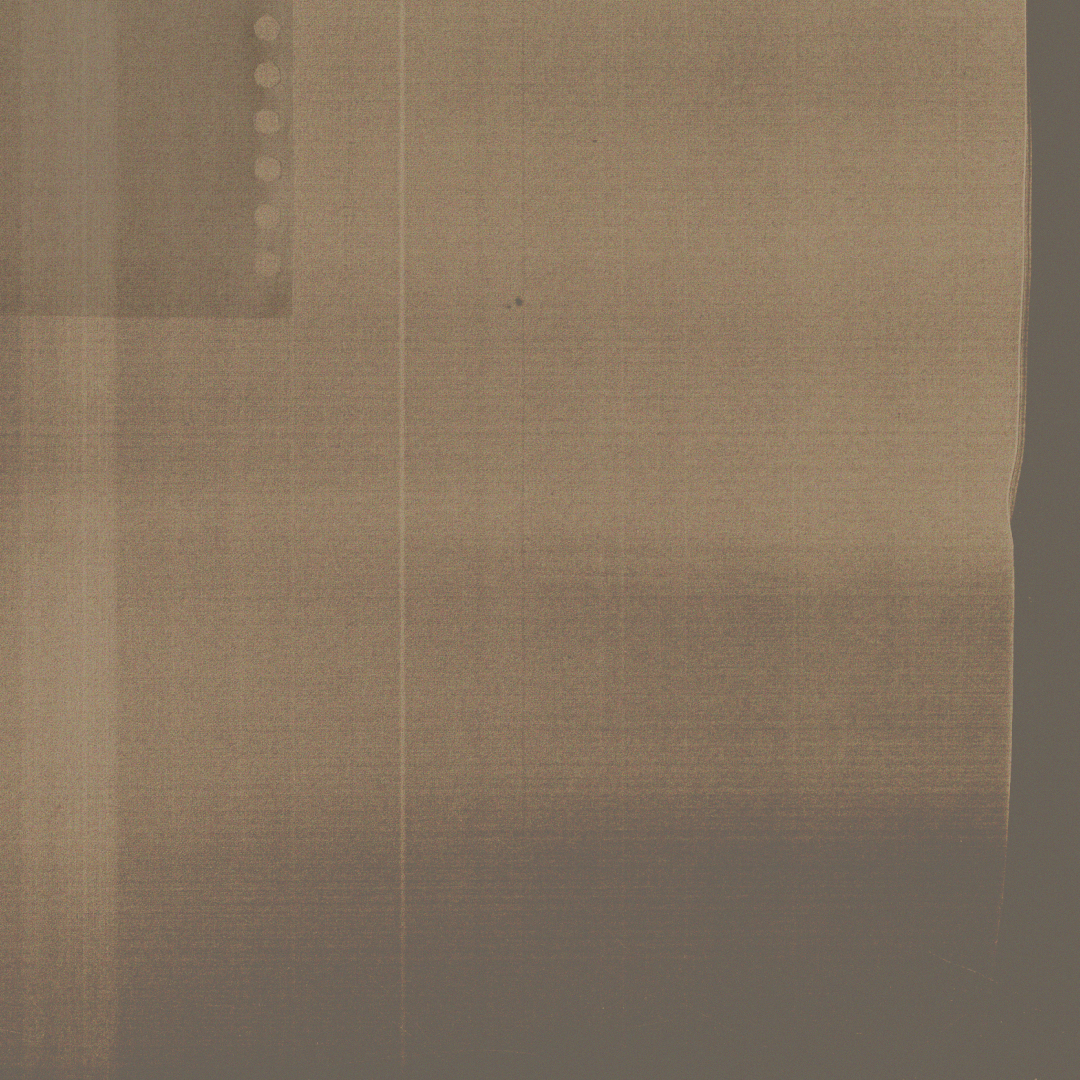 Close-up view of a wooden wall or panel with visible grain and texture.