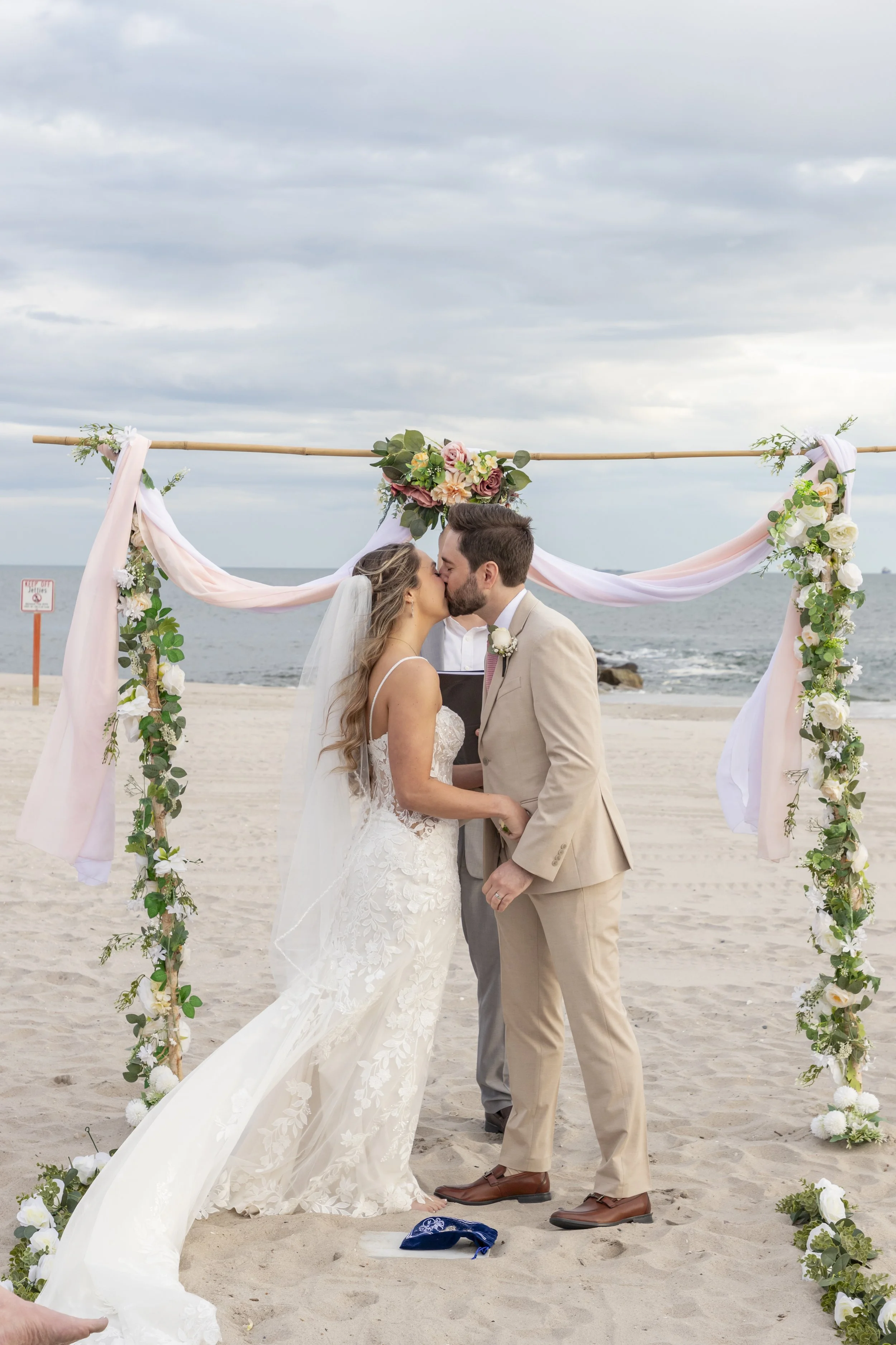 Luxury elopement couple popping champagne during their wedding ceremony celebration. Shot by Pop-Up Vows’ content team as part of our all-inclusive photography + video package.