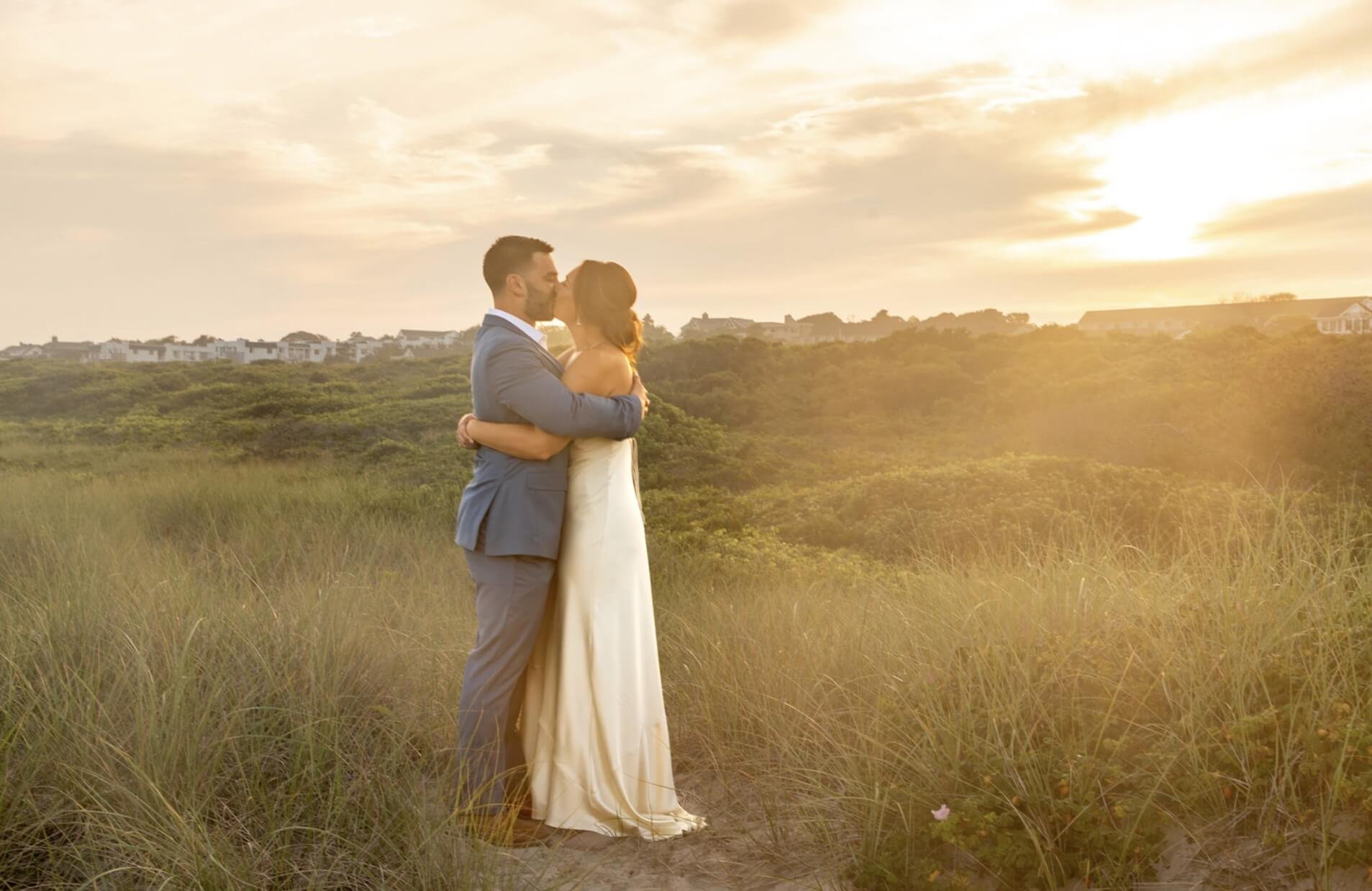 A romantic Montauk beach elopement with a couple exchanging vows at sunset.