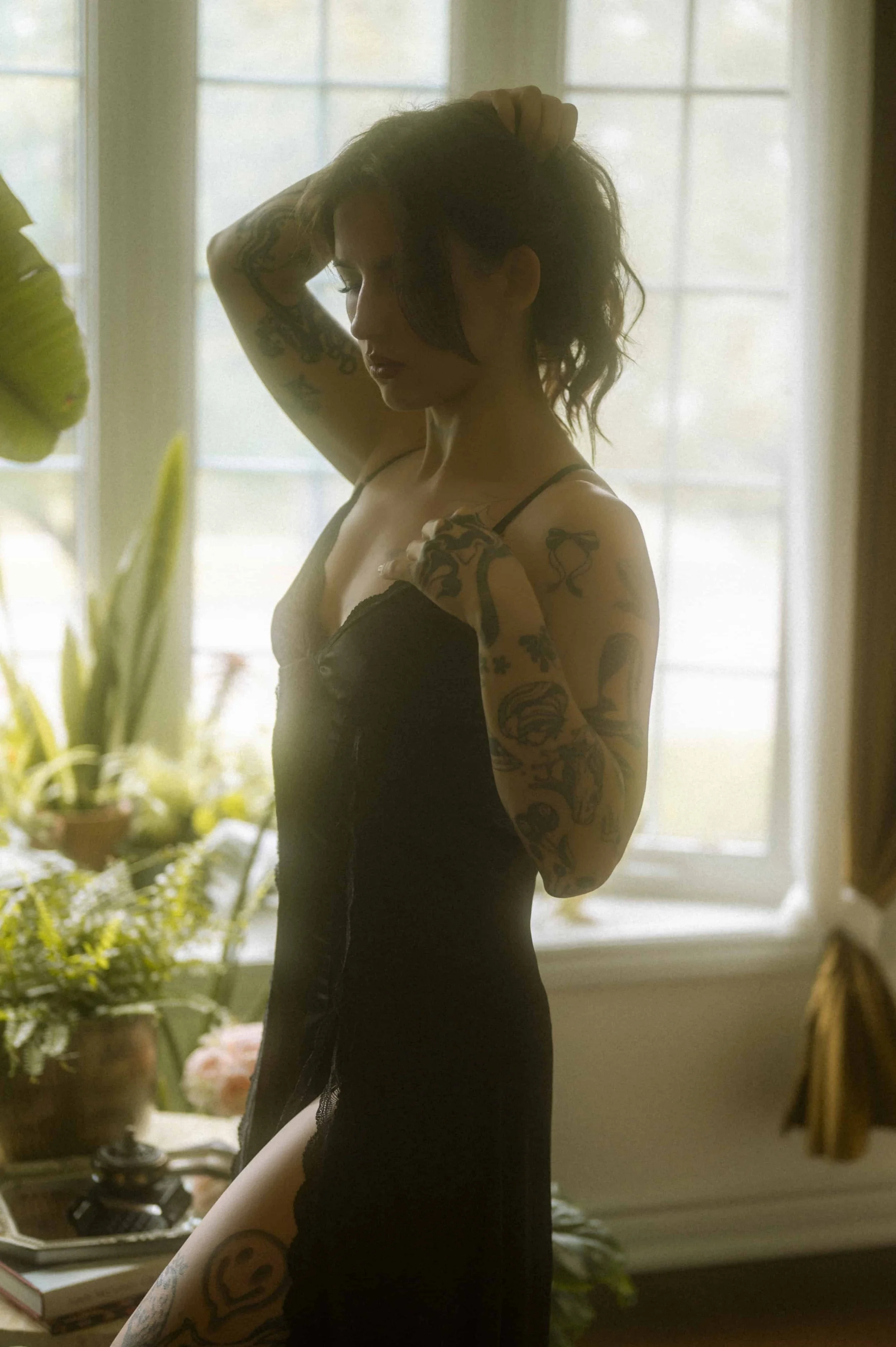 woman posing in natural dreamy light at toronto boudoir studio