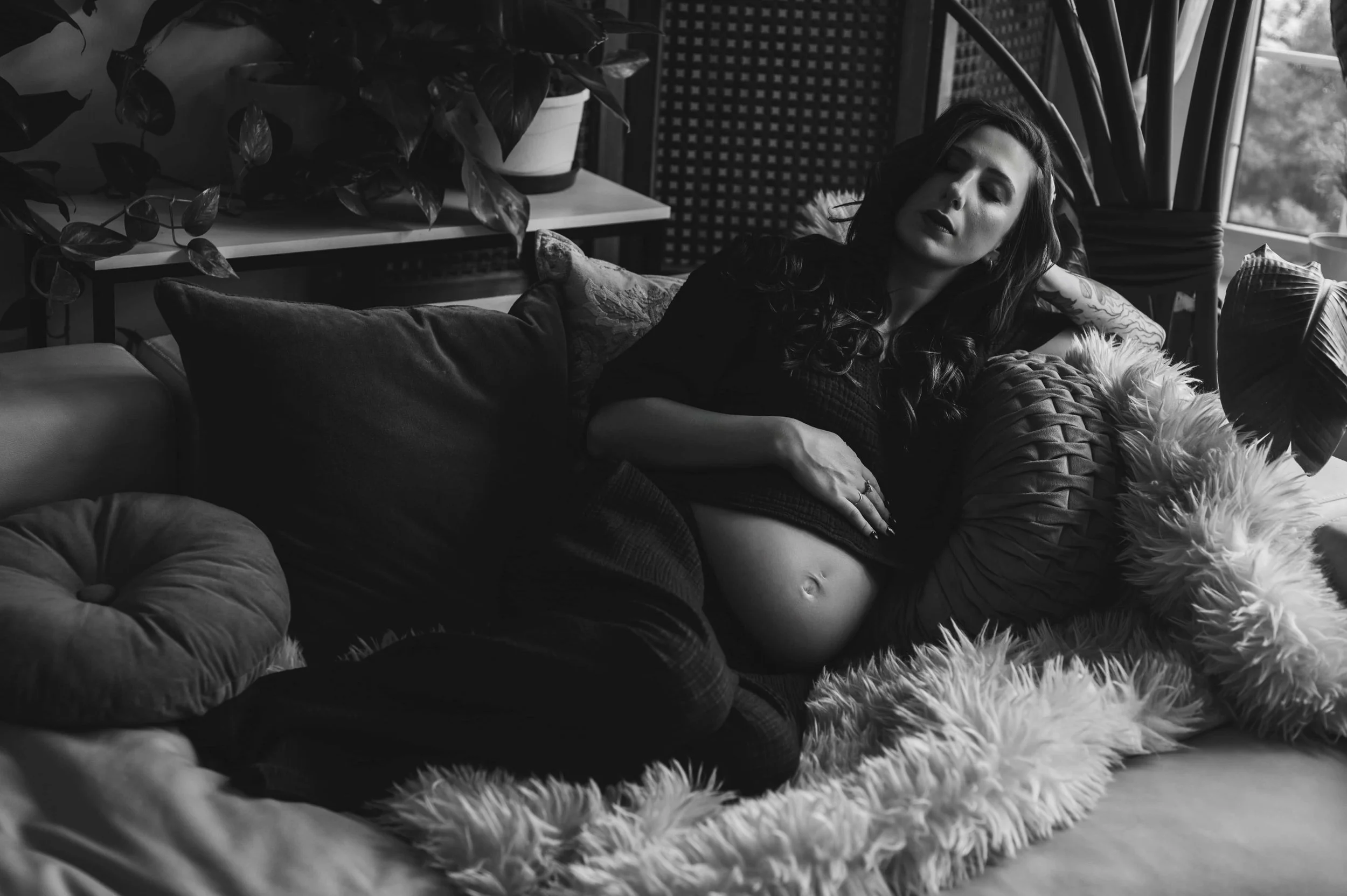Relaxed maternity portrait in a warm, natural light Toronto photography studio
