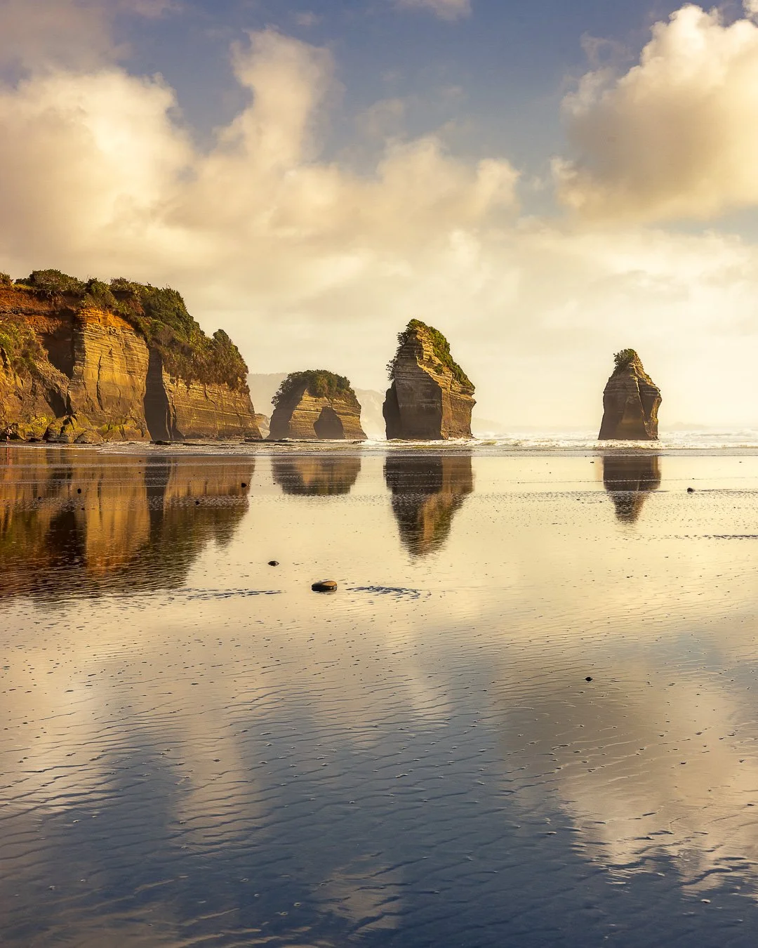 Taranaki &mdash; A Sense of Rhythm and Contrast.

My time in Taranaki earlier this year was shaped by contrast. From fast-moving river rapids leading the eye toward Mount Taranaki, to calm, rocky seascapes where time seemed to slow, the landscape rev