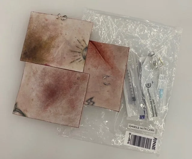 'Study for a Self Portrait', foam paper, gouache, surgical steel jewelry, testosterone vial, 1mL syringe, alcohol prep pads. 2024. 