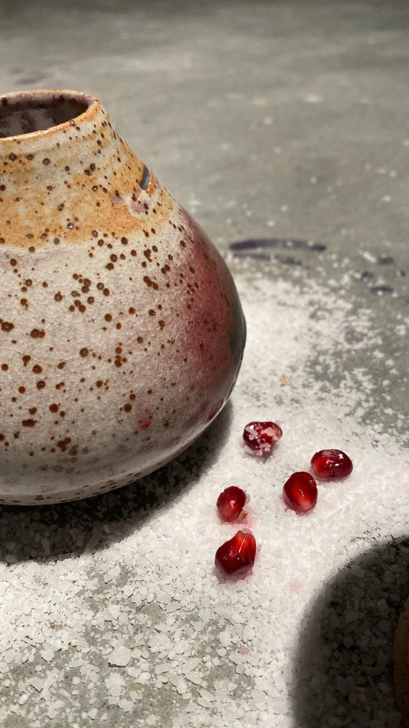 'WHAT CONSUMES YOU' Installation, cone 10 reduction. Wheel thrown and bitten. 2025.