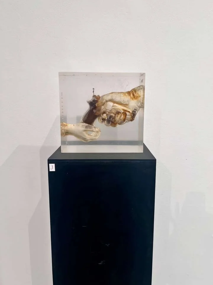 Candice Scott, "Inheritance or Surrender", resin cast, 12 x 6 x 10". 