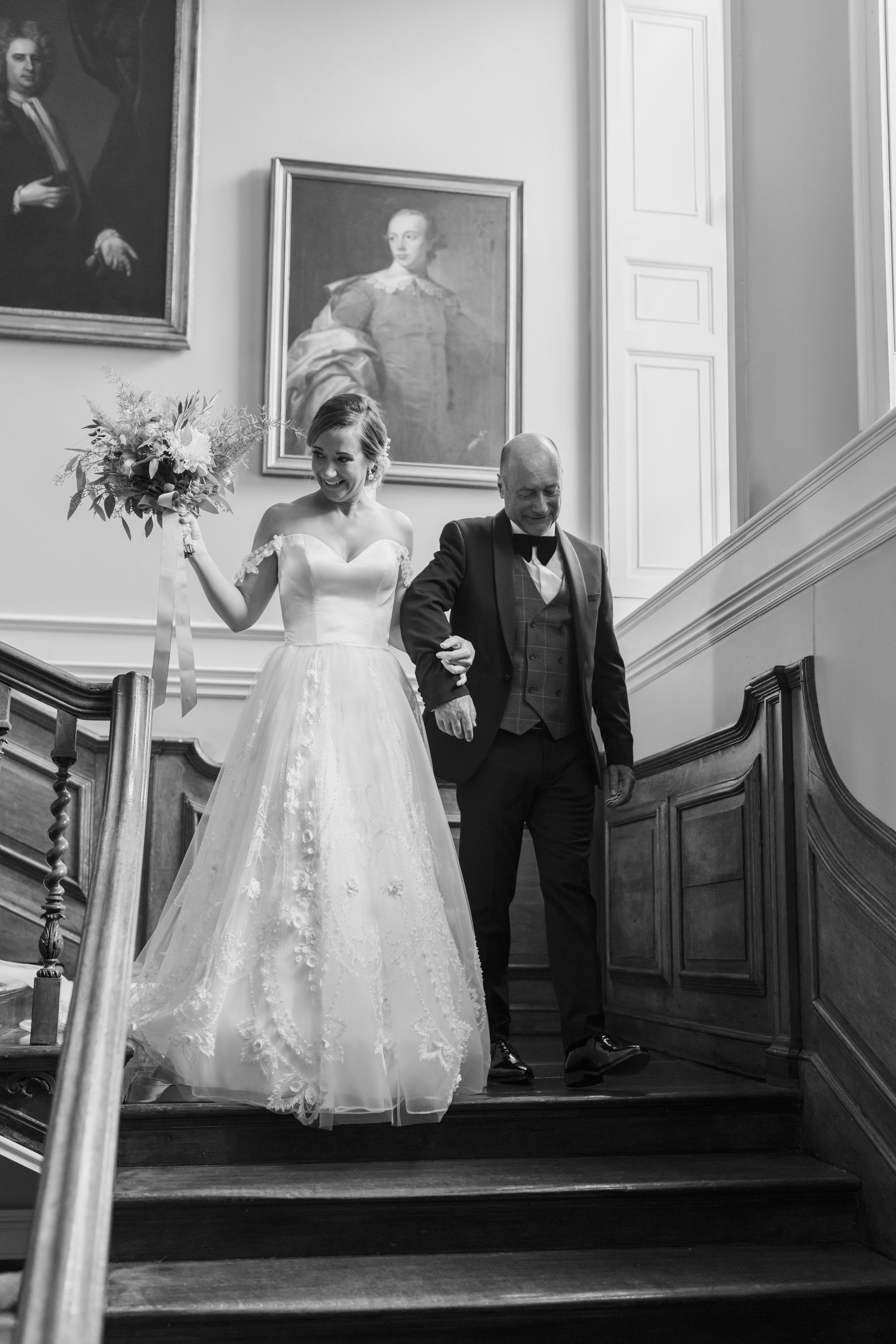  bride and father walking down the stairs at Goodnestone Park 