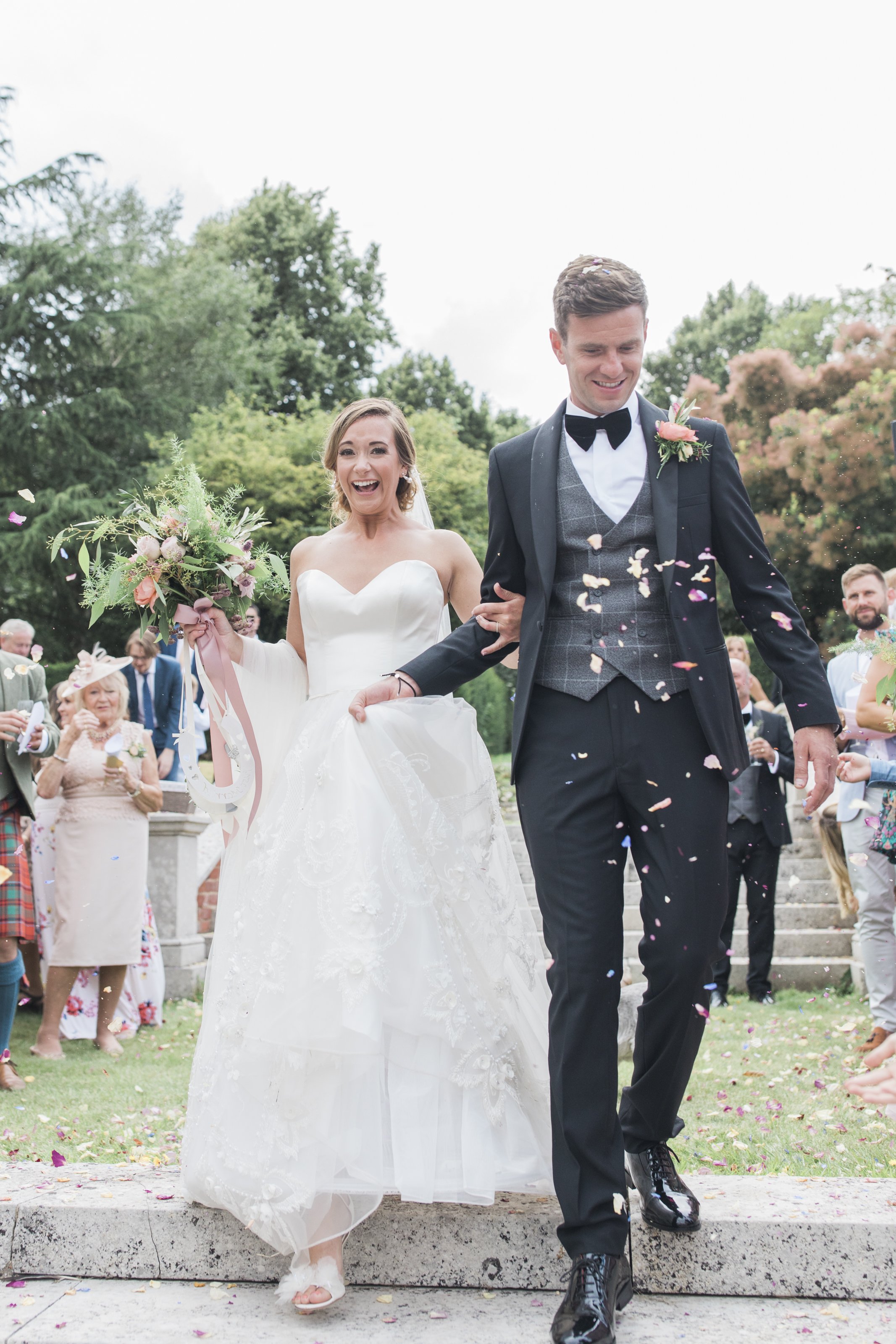  bride and groom confetti at goodnestone park 