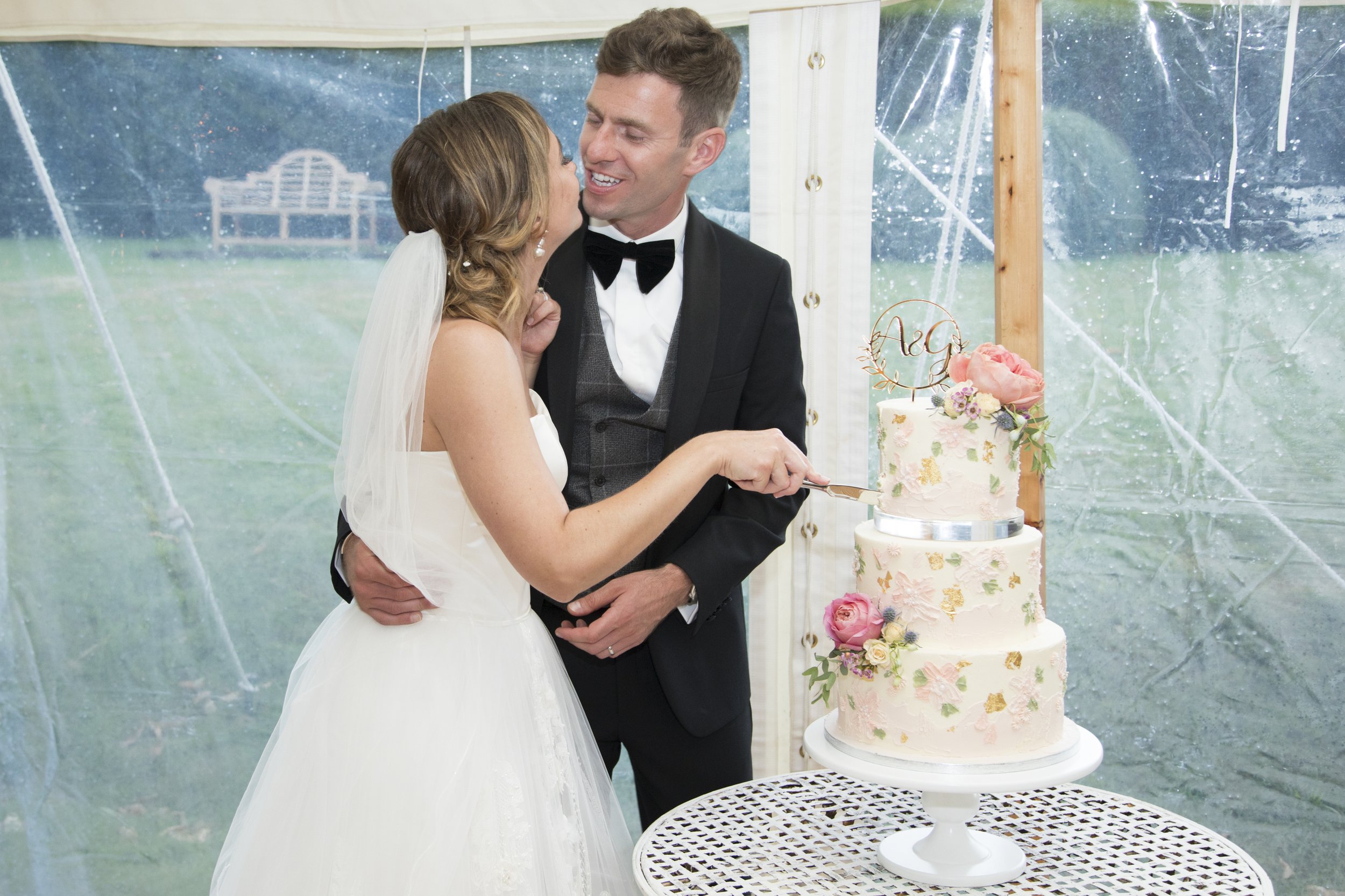  Bride and Groom cutting cake at Goodnestone Park 