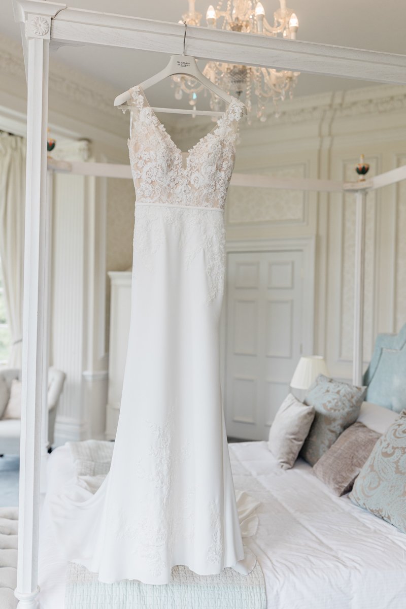 Wedding dress hanging in Hedsor House