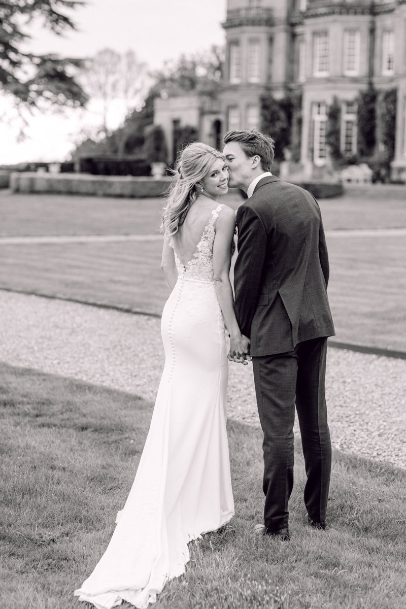 bride and grooming outside Hedsor House