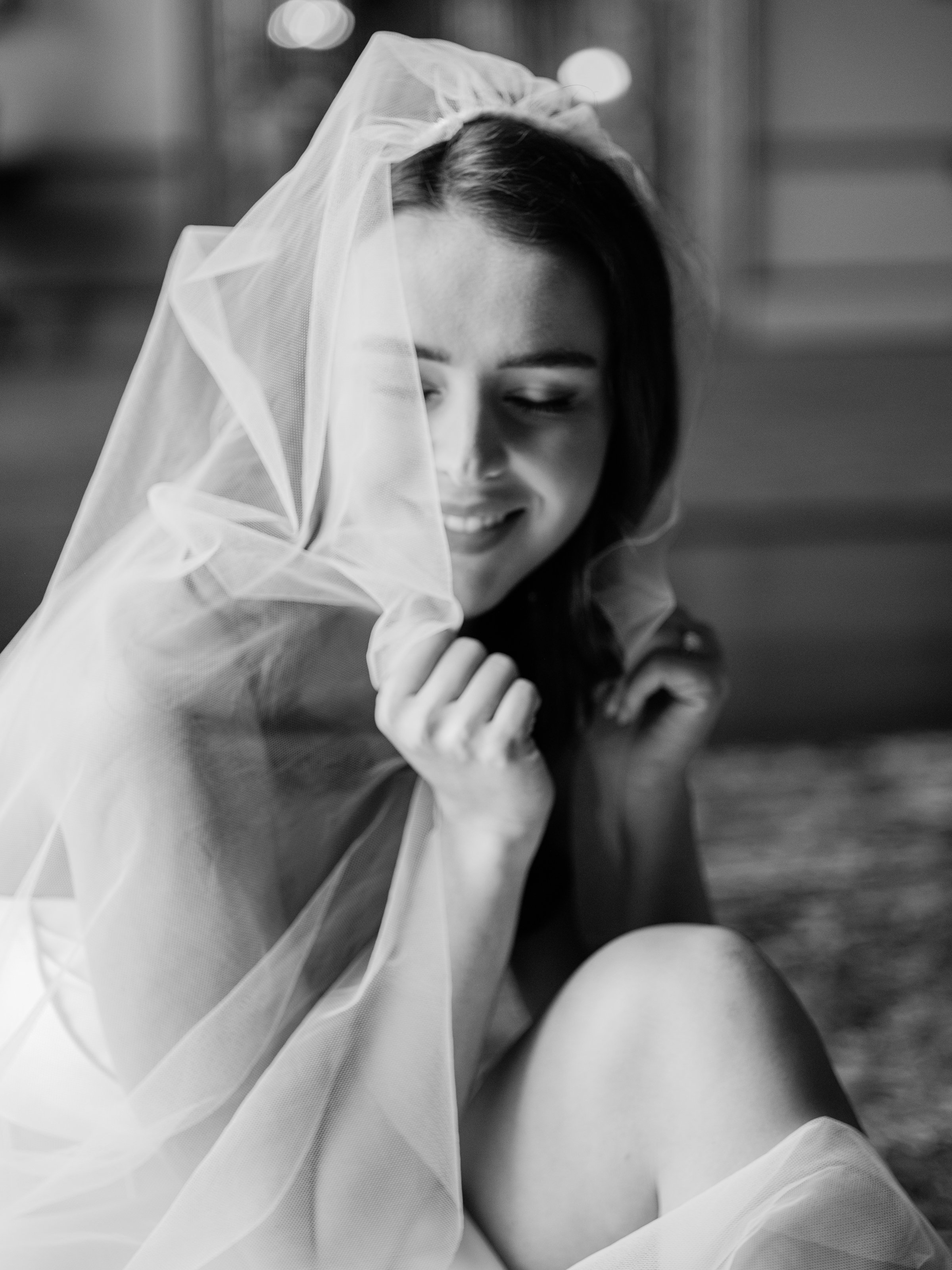 Bride with veil over face at Somerley House wedding venue