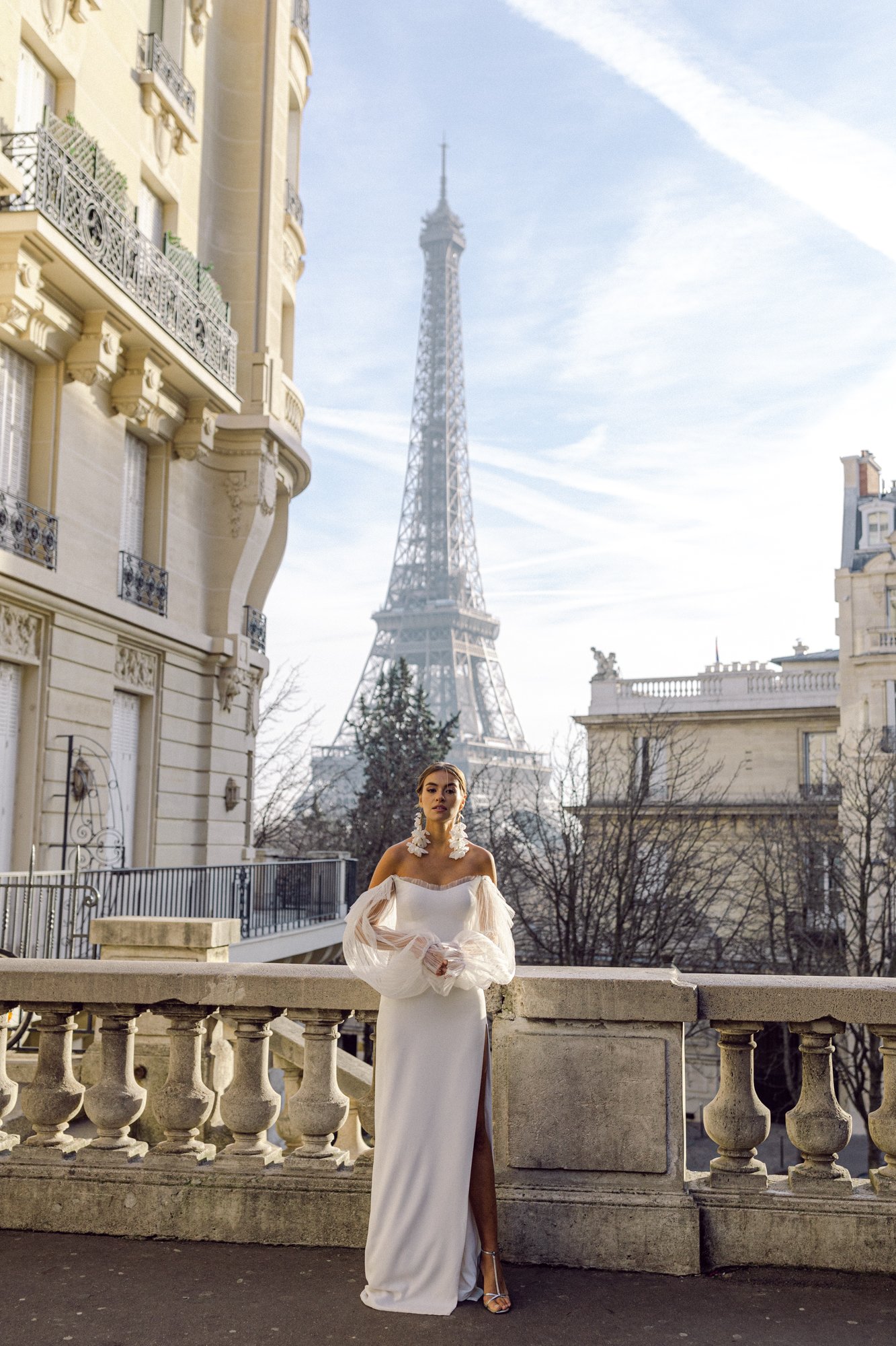 Bride outside the Eiffel Tower in Paris wedding