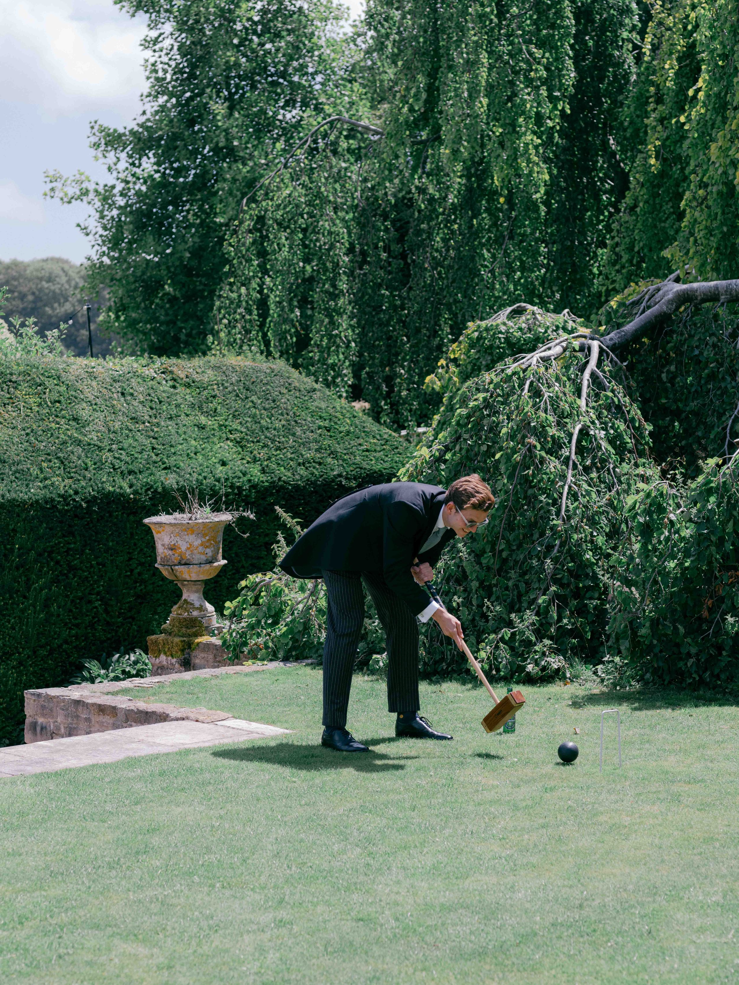  Groomsmen playing croquet at Came House 