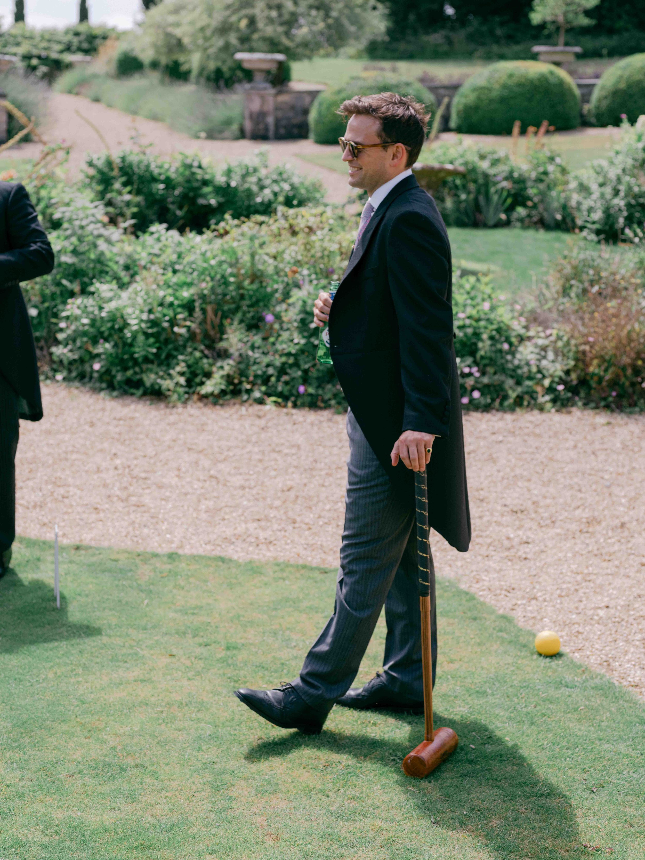  Groom playing croquet 