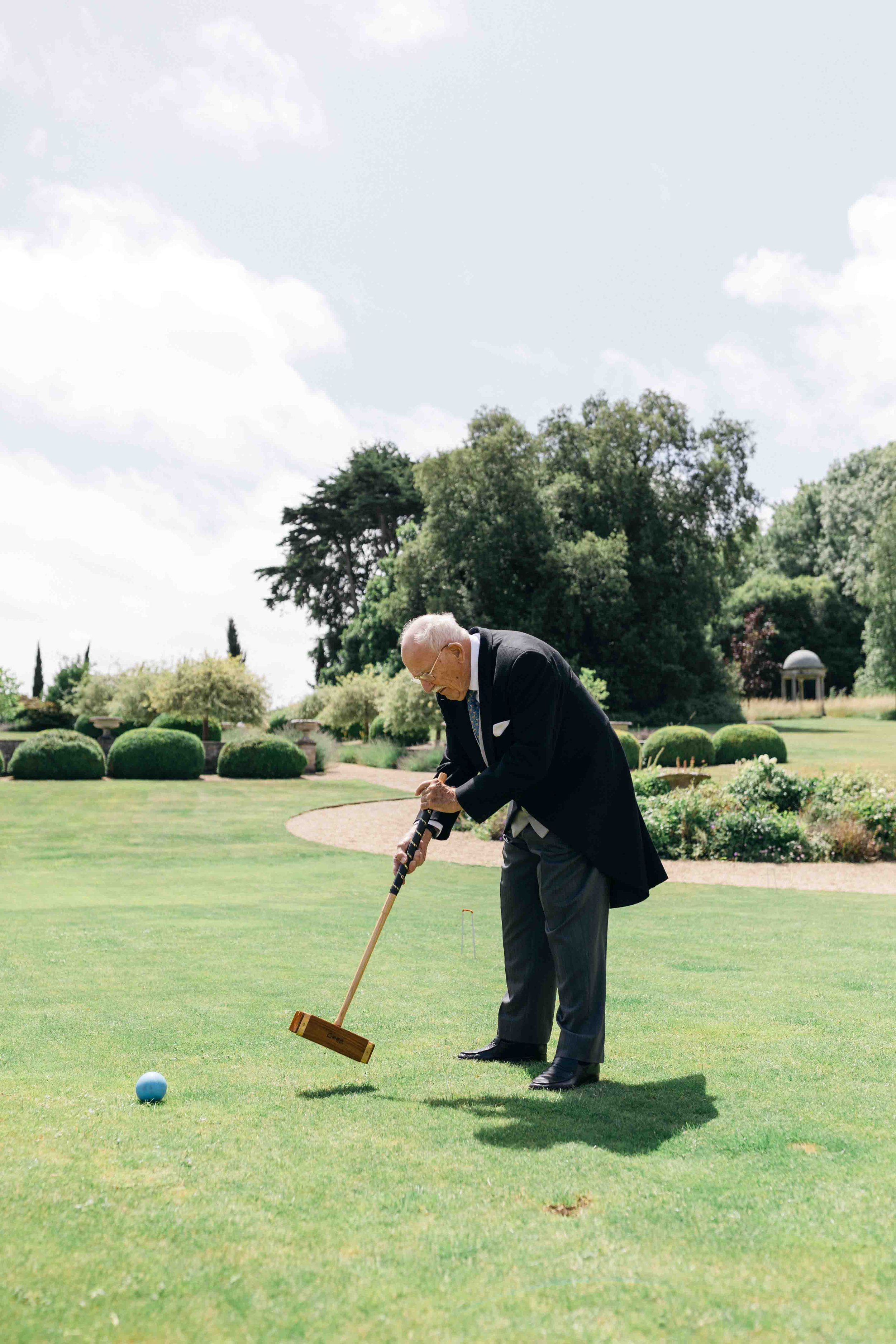  Groomsmen Grandfather playing croquet at Came House 