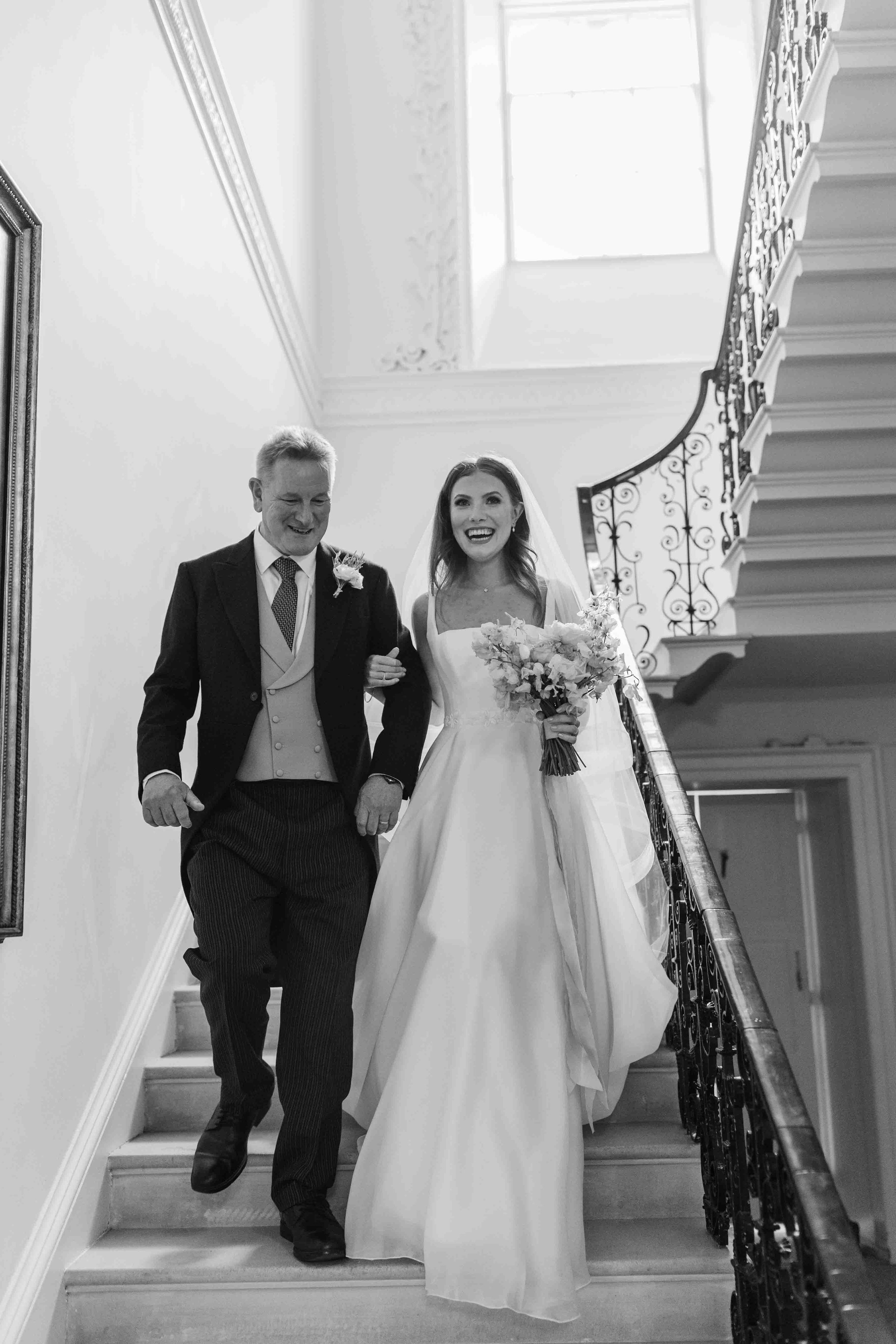  Bride and Father walking down the aisle 