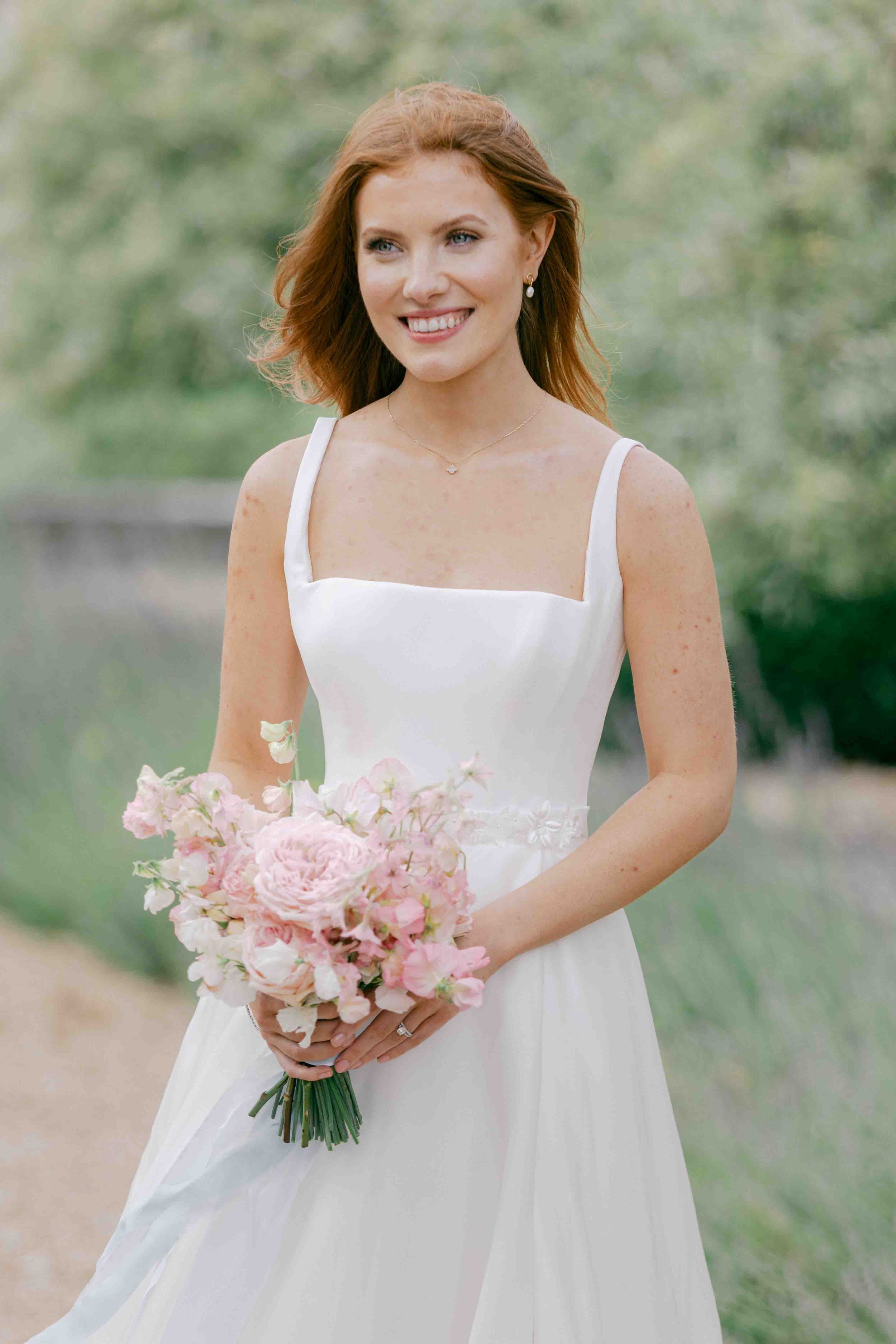  Bride portrait holding flowers 