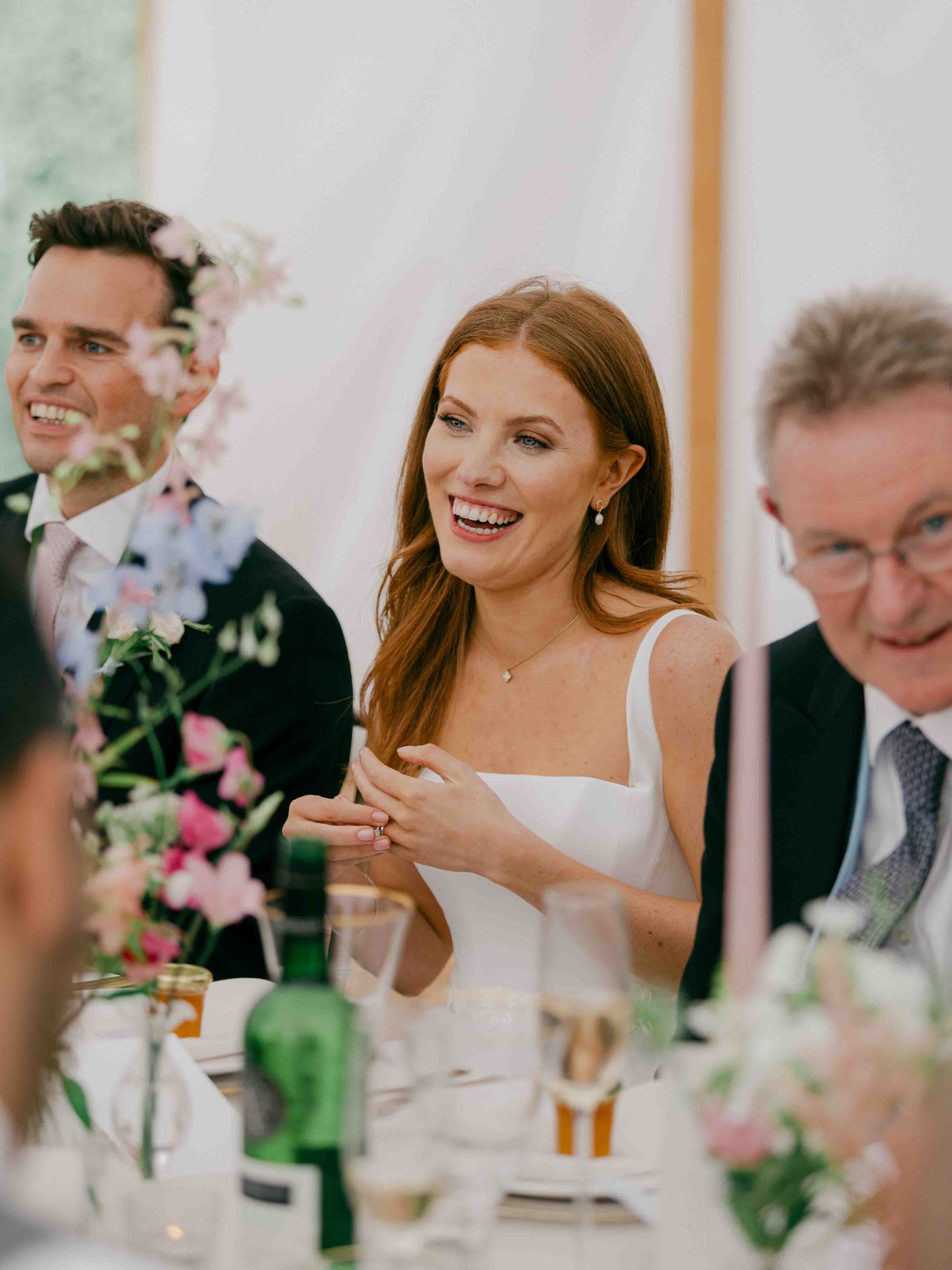  Bride laughing at speeches 