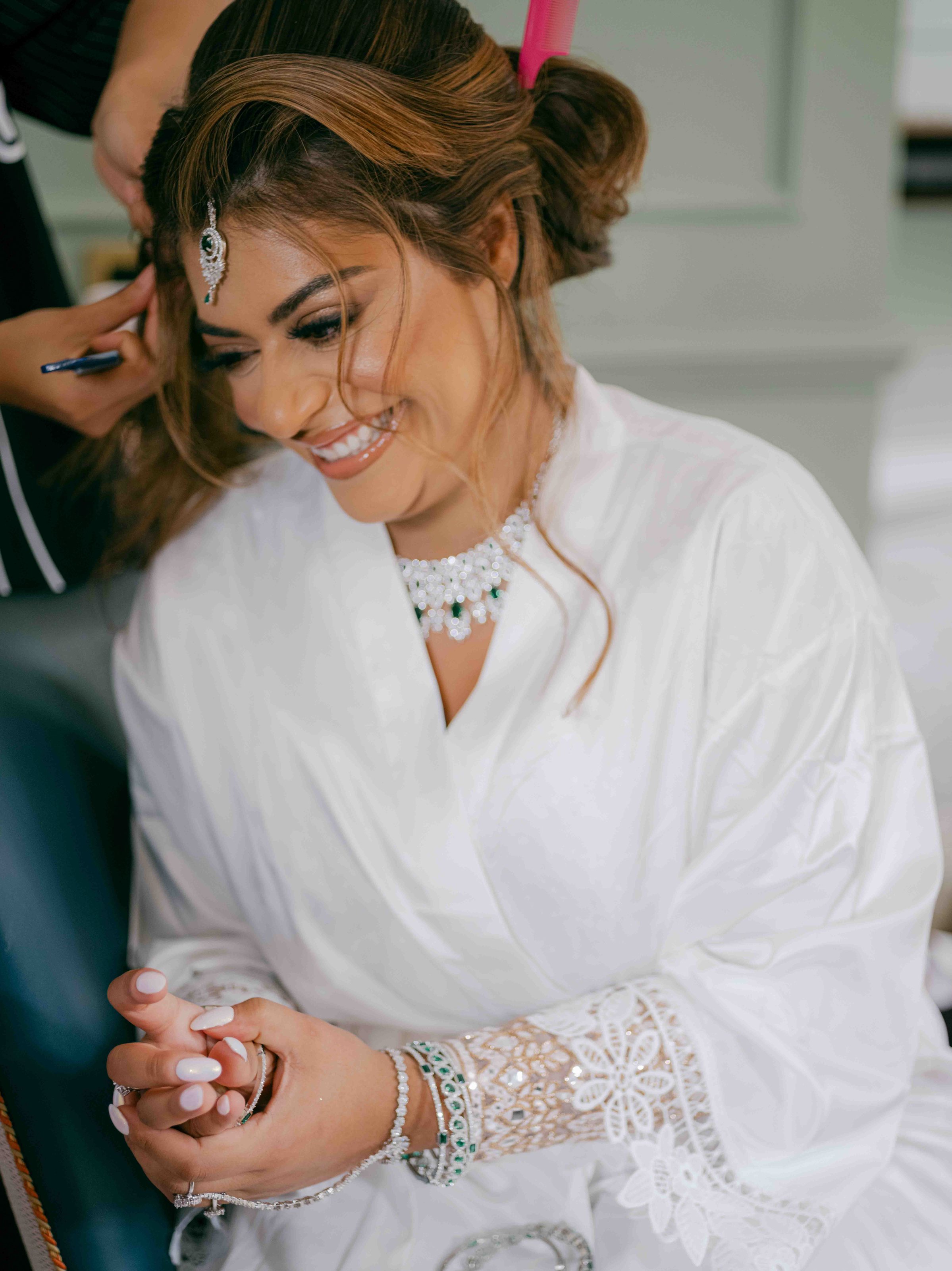  bride getting ready and having her hair done 