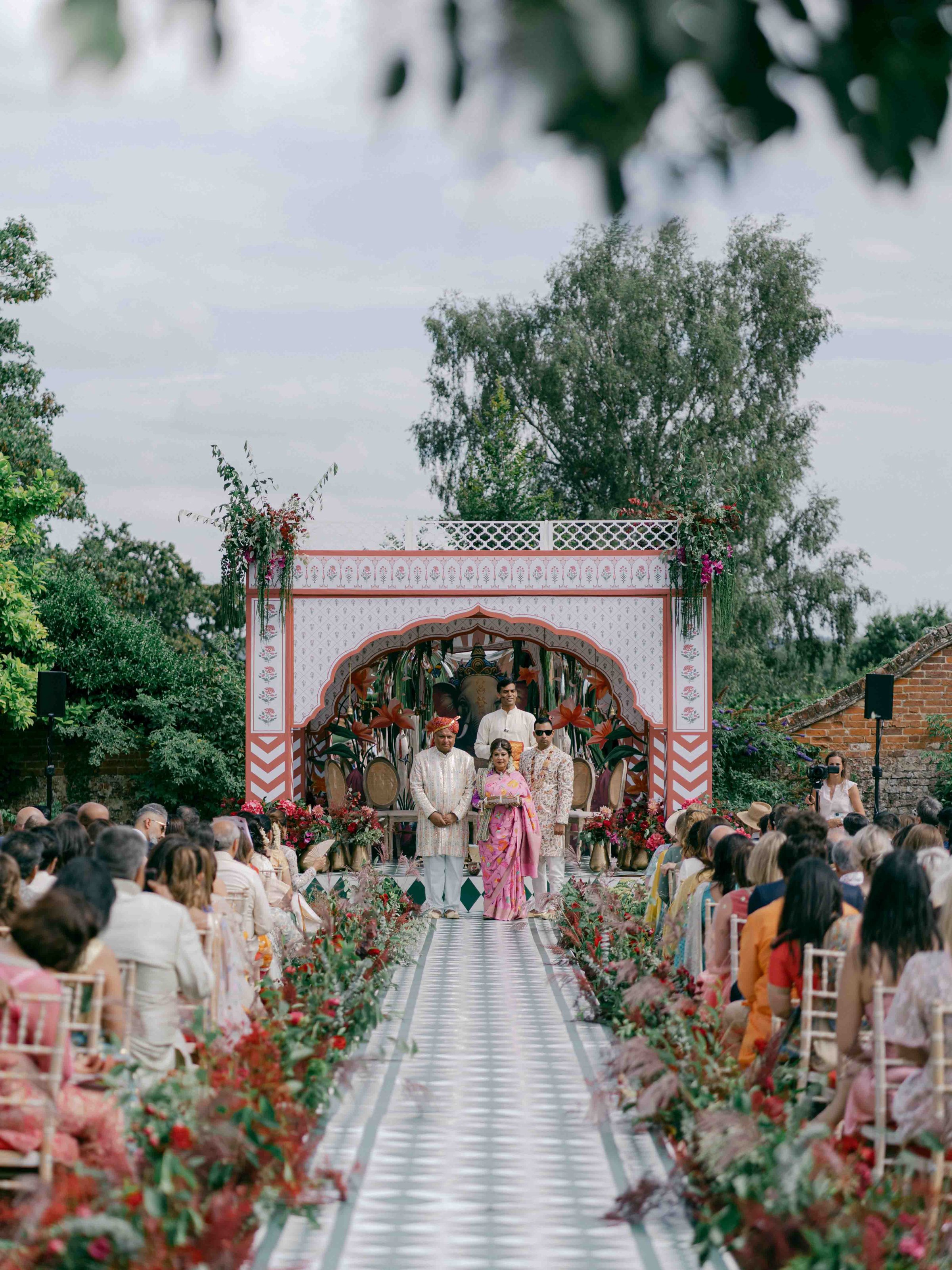  a wide shot of the wedding aisle. 