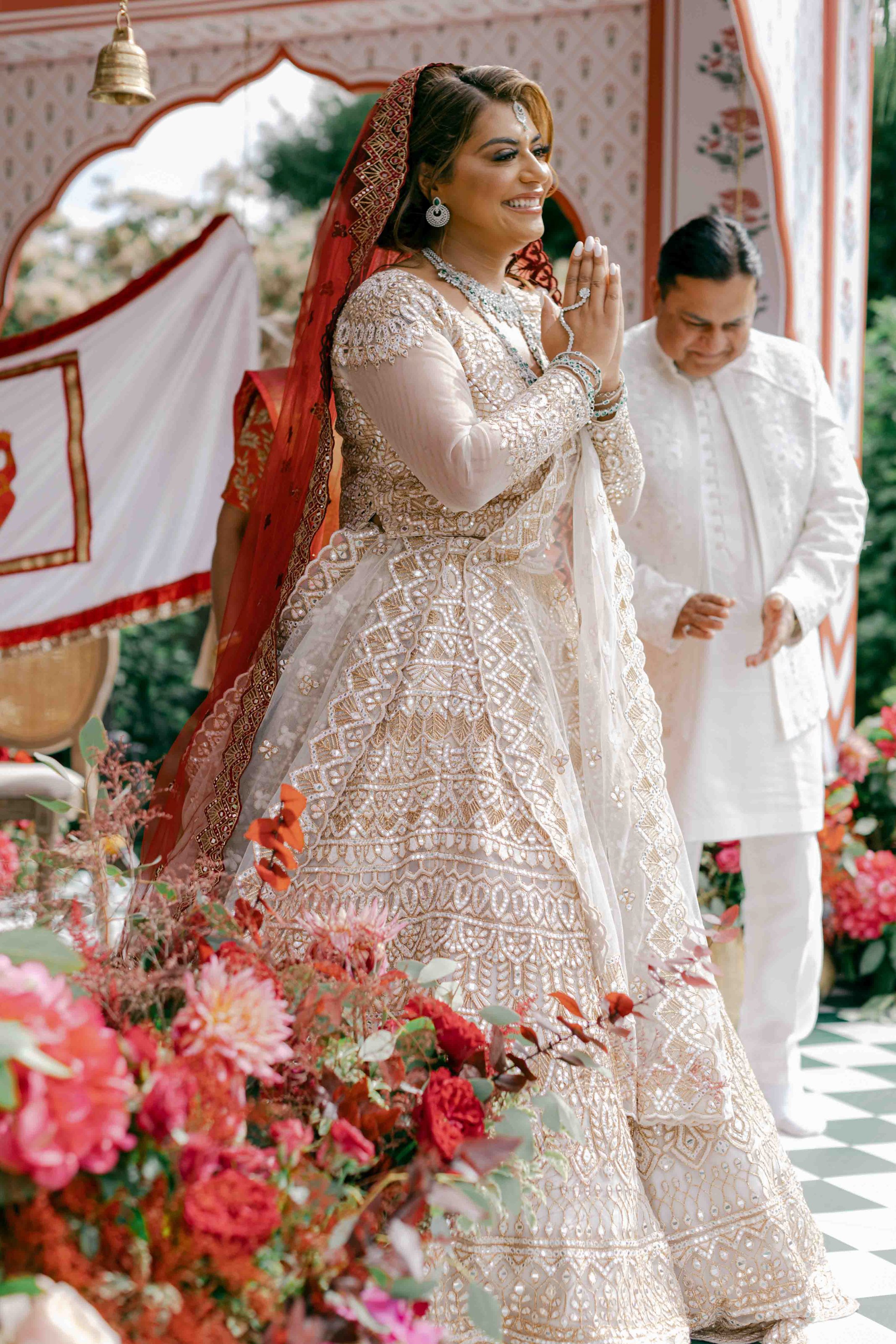 bride praying and facing guests 