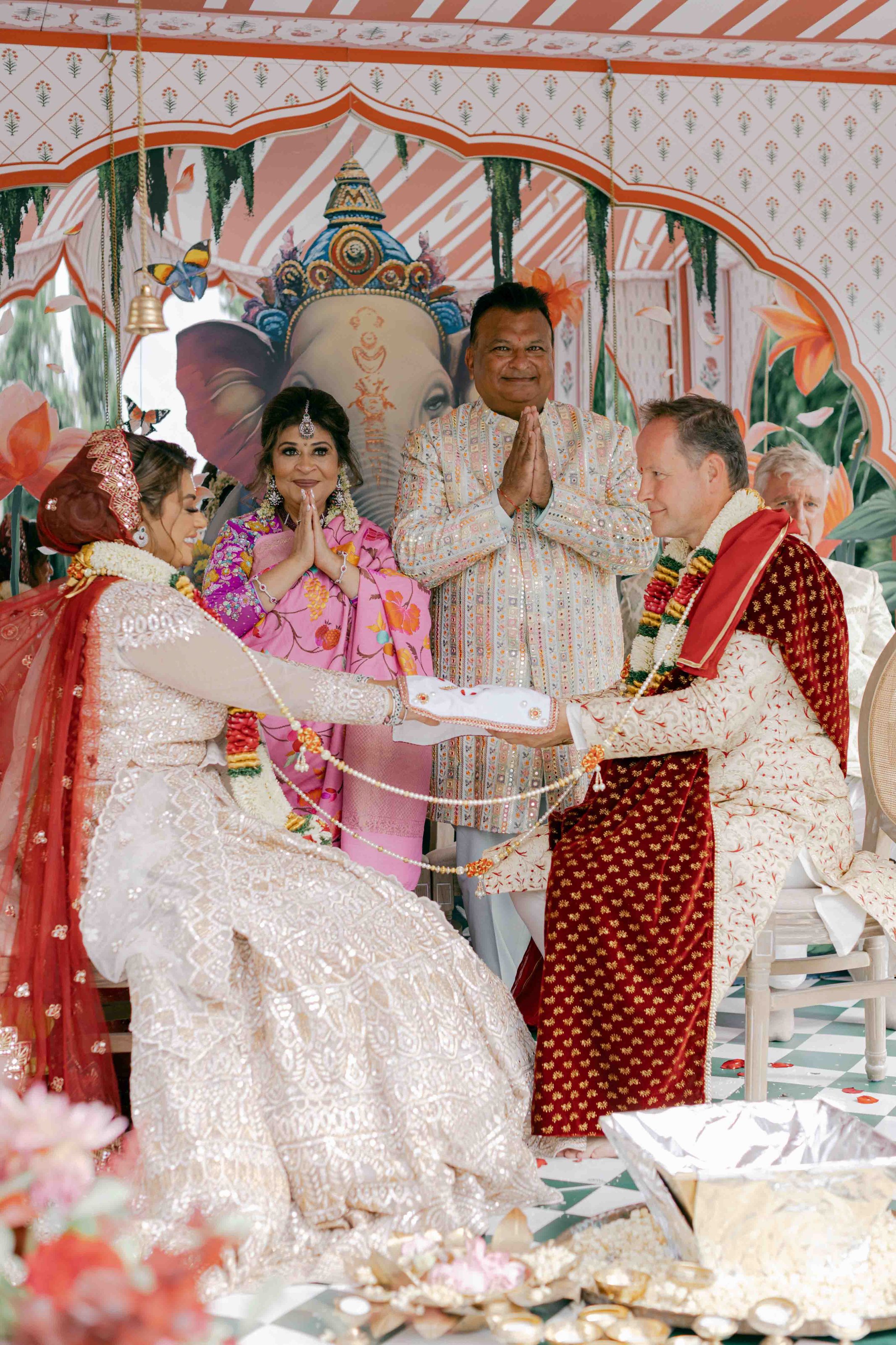  bride and groom holding hands under the Mendap 
