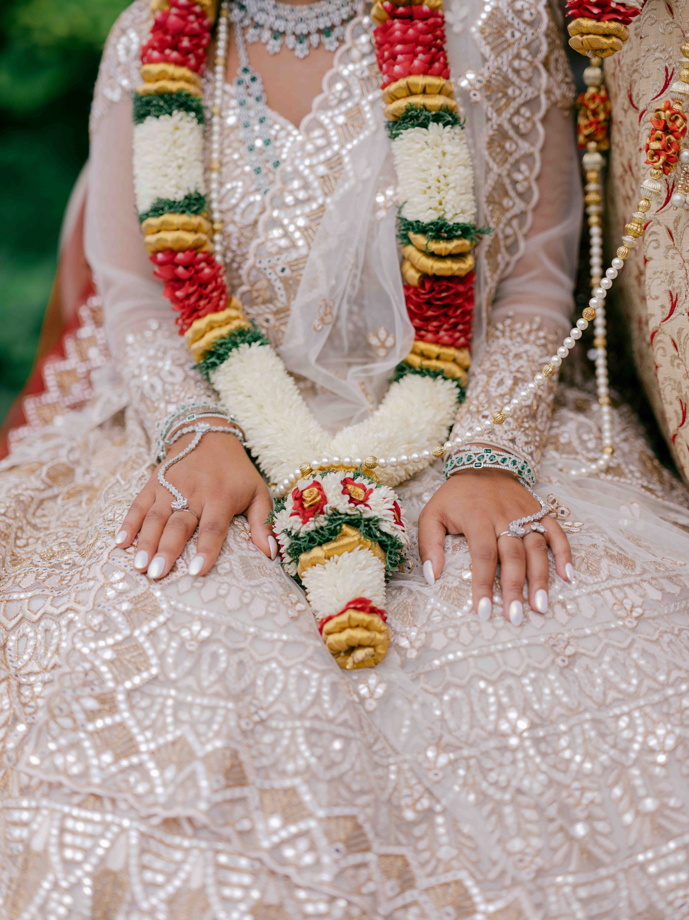  bride wearing flower garland 