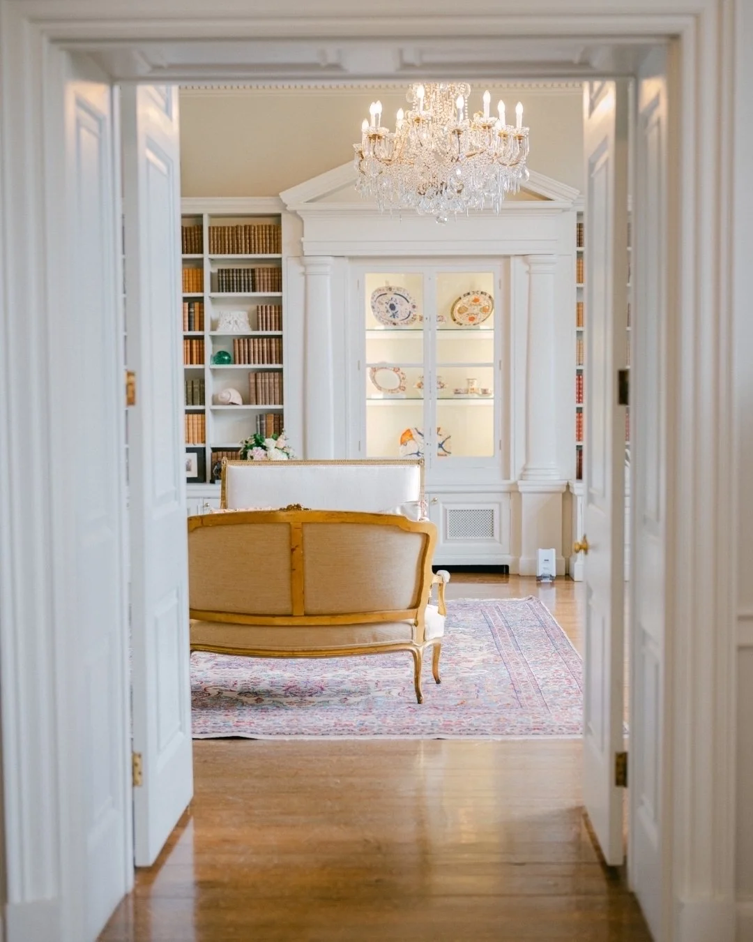 Cowdray House is such a perfect venue for fine art wedding photography because the space itself does so much of the work naturally. The soft light throughout the house, the neutral interiors and the surrounding landscape all photograph beautifully wi