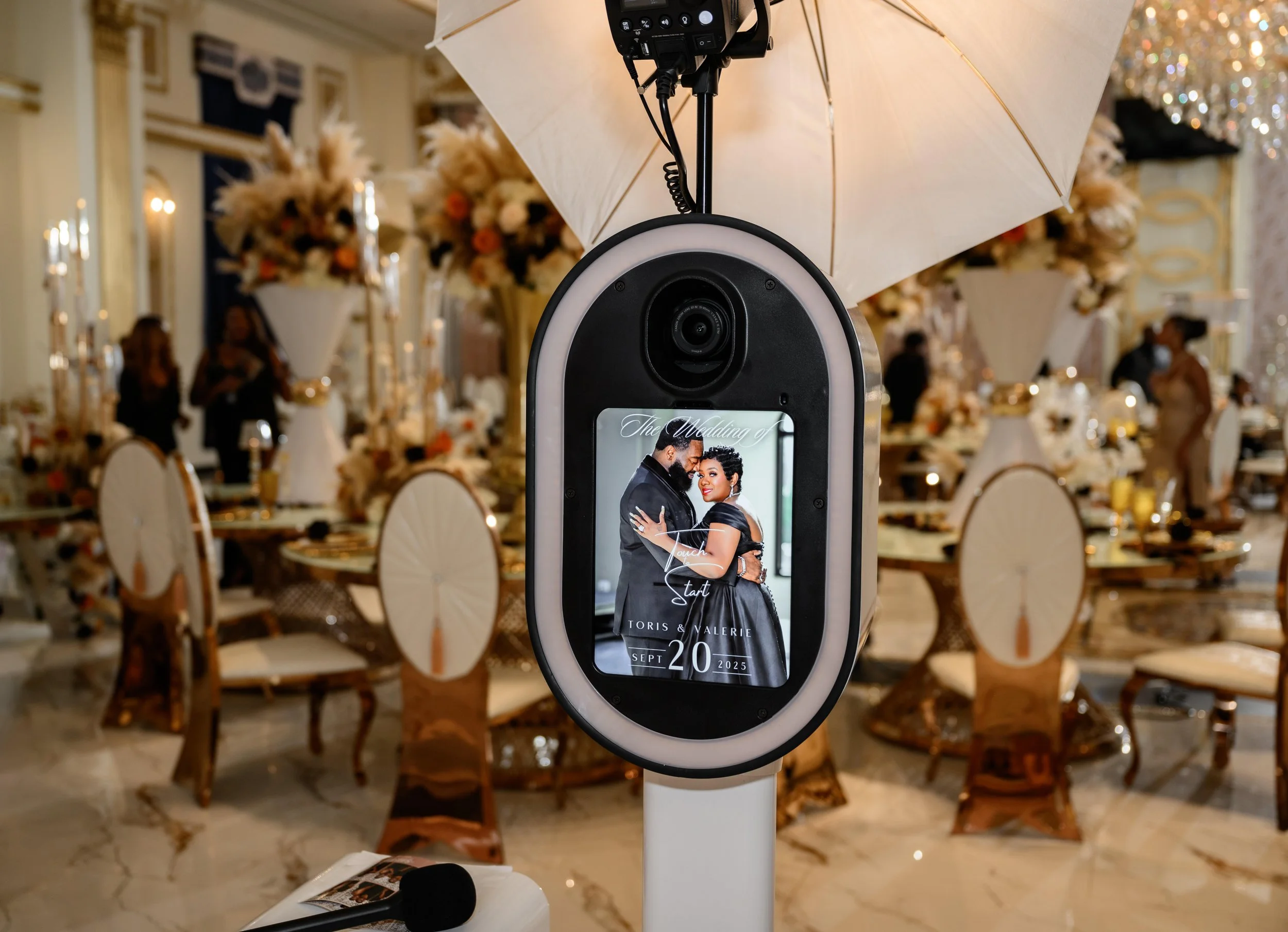 Digital photo booth set up inside a wedding reception at Shahbain Events Center in North Carolina.