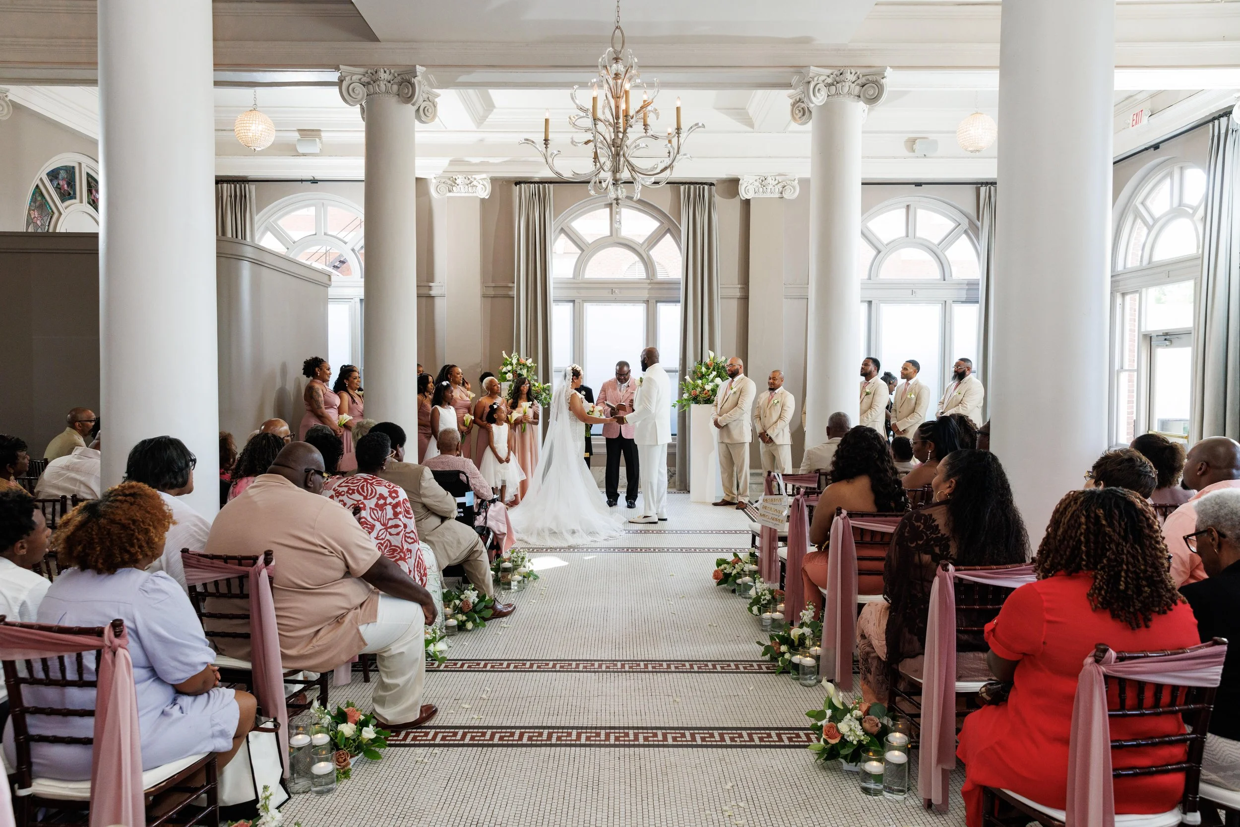 Wedding ceremony inside Georgian Hall featuring the venue’s architectural details.