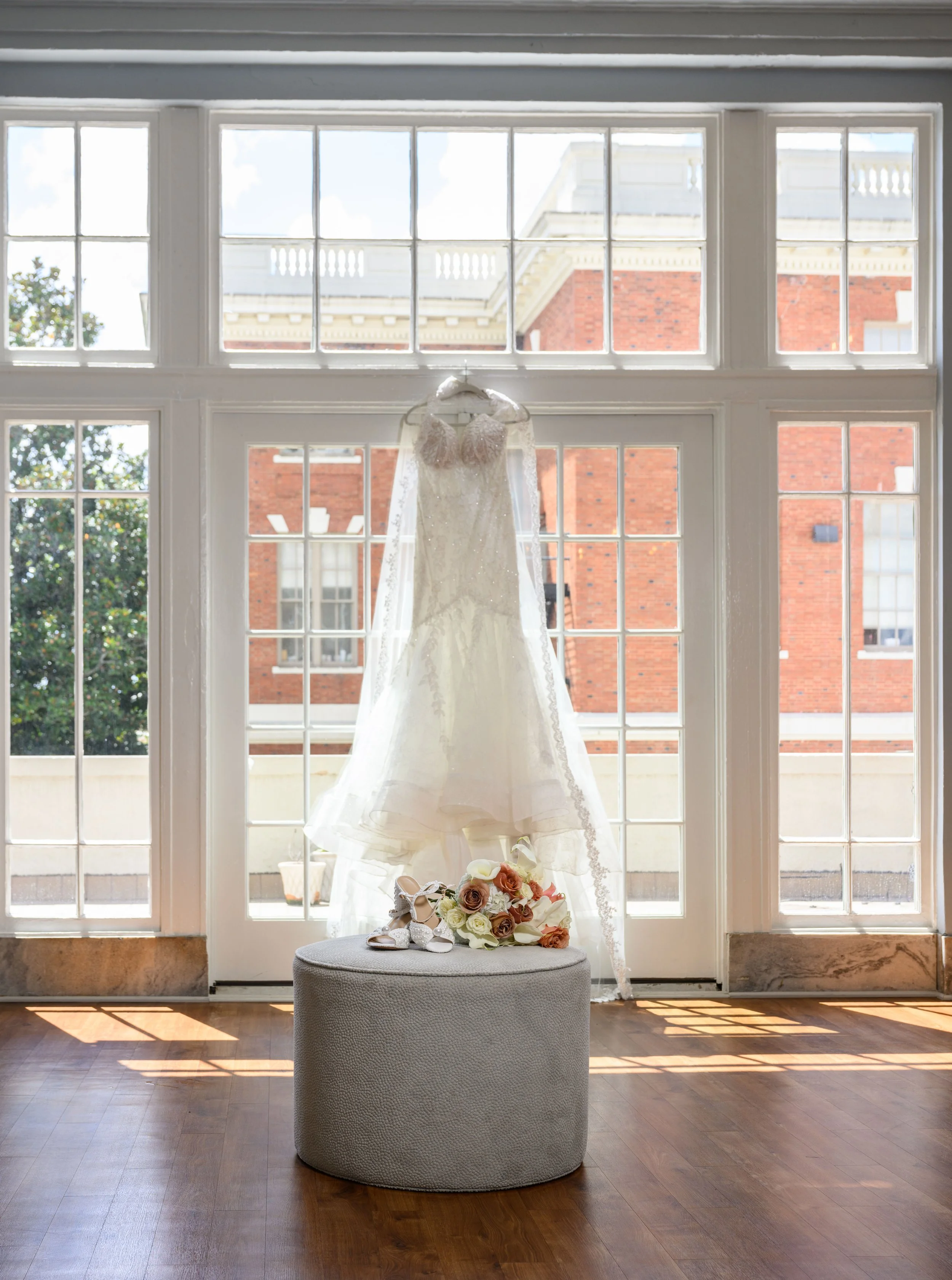 Wedding dress displayed in the window before a Georgian Hall wedding in Athens.