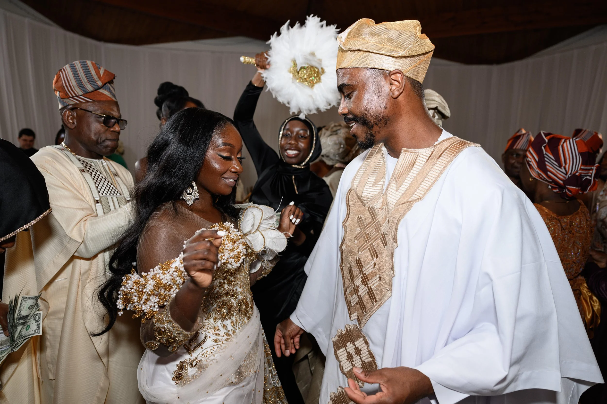 Family and friends celebrating with Jalisa and Sadiq during their Nigerian wedding