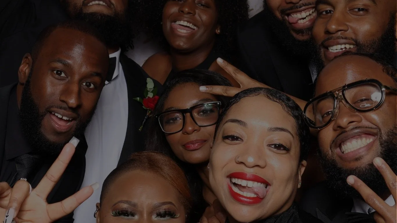 Wedding guests having fun together in The Artis Touch Photo Booth at an Atlanta wedding.