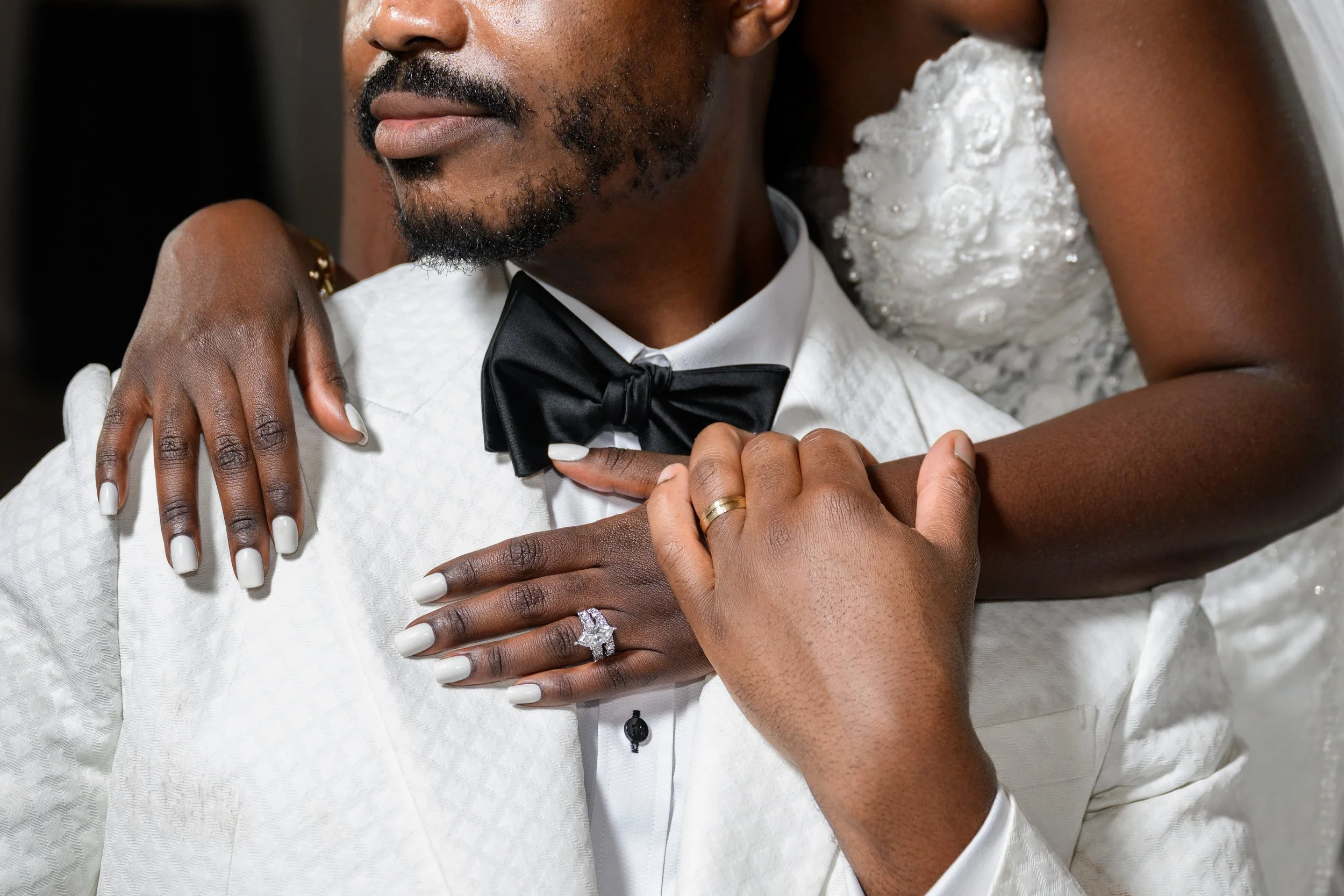 Close-up of Jalisa and Sadiq's wedding rings