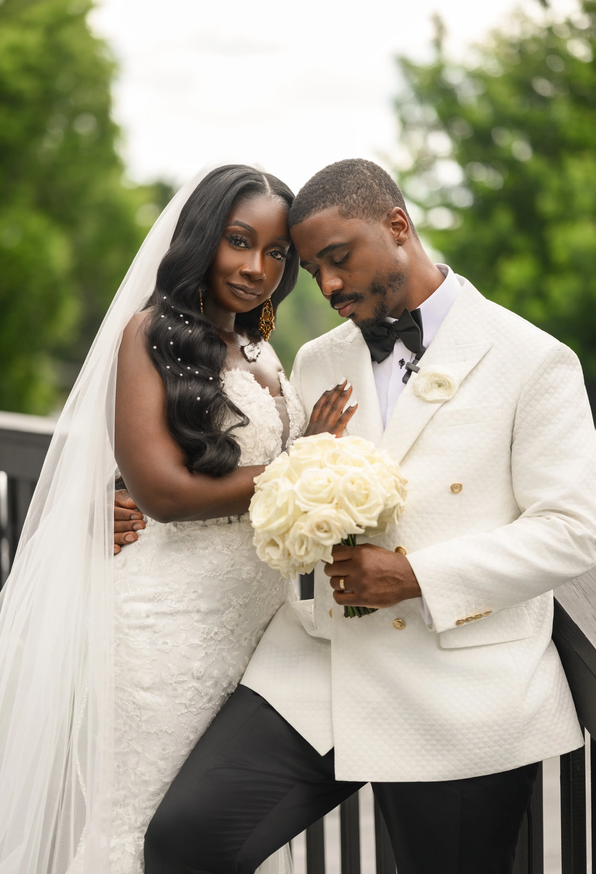 Jalisa and Sadiq sharing a quiet moment during their wedding portraits