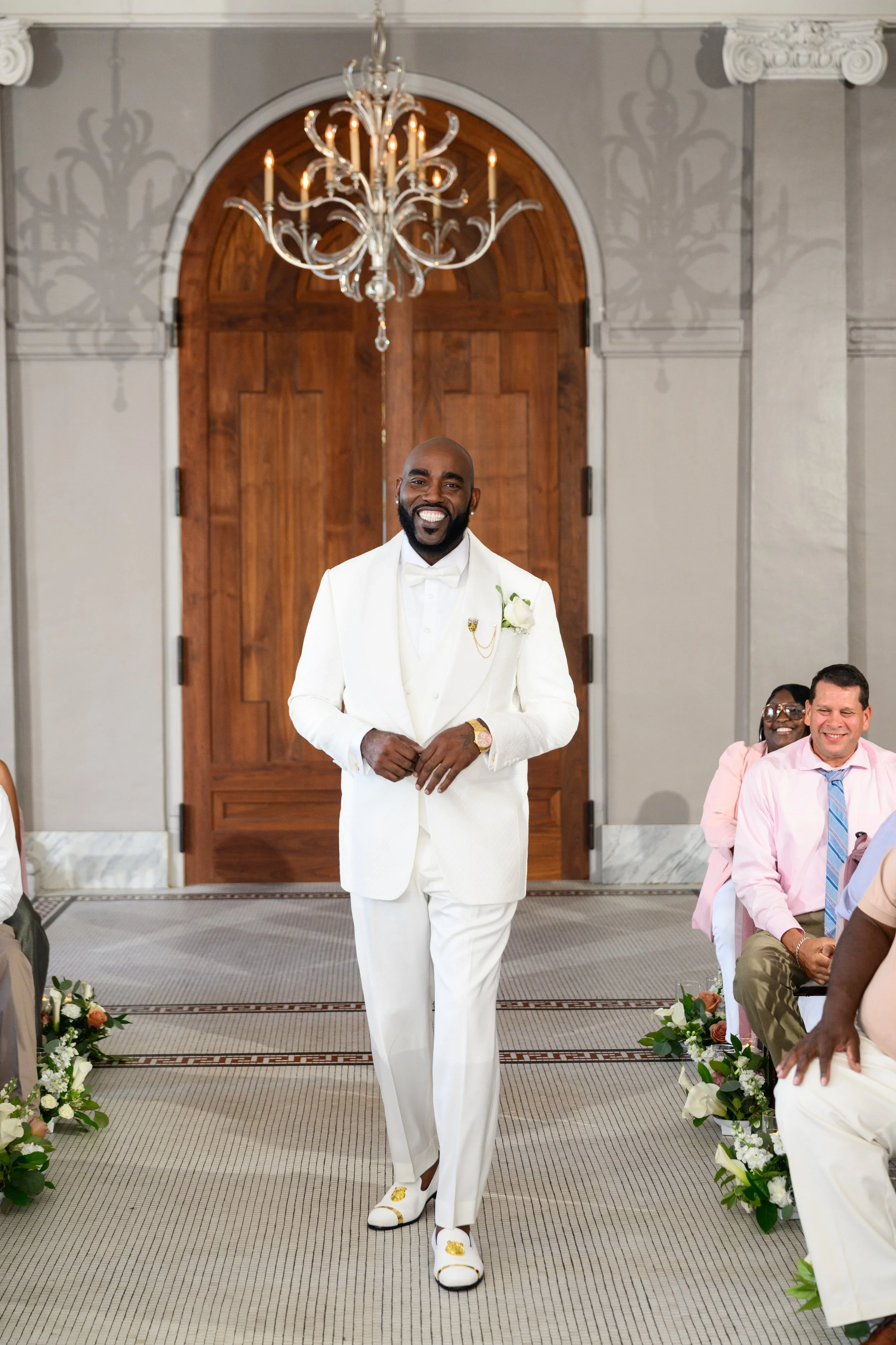 Groom entering his wedding ceremony at Georgian Hall in Athens.