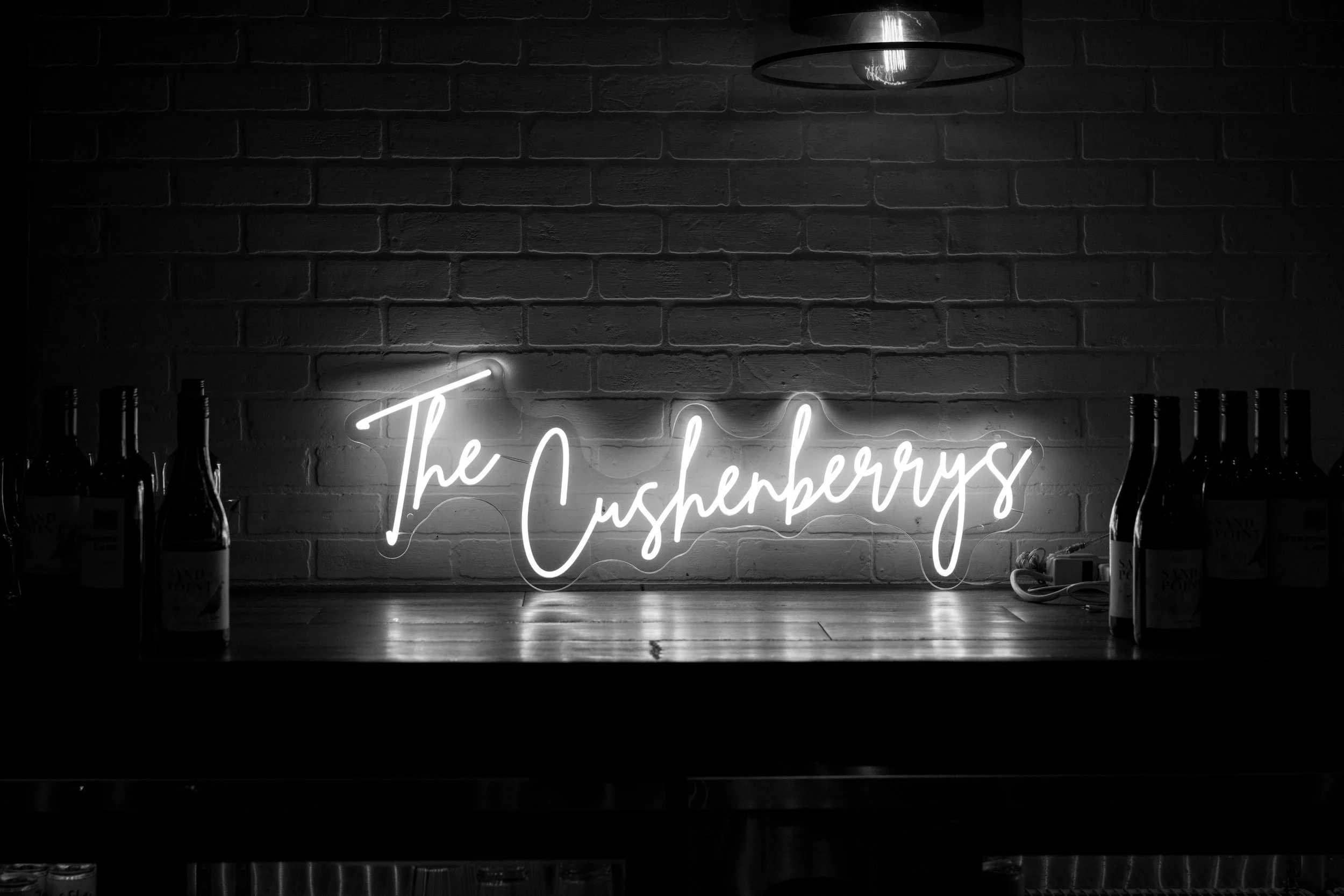 The Cusherberrys illuminated wedding sign displayed during the reception at The Venue at Daisy Hill.