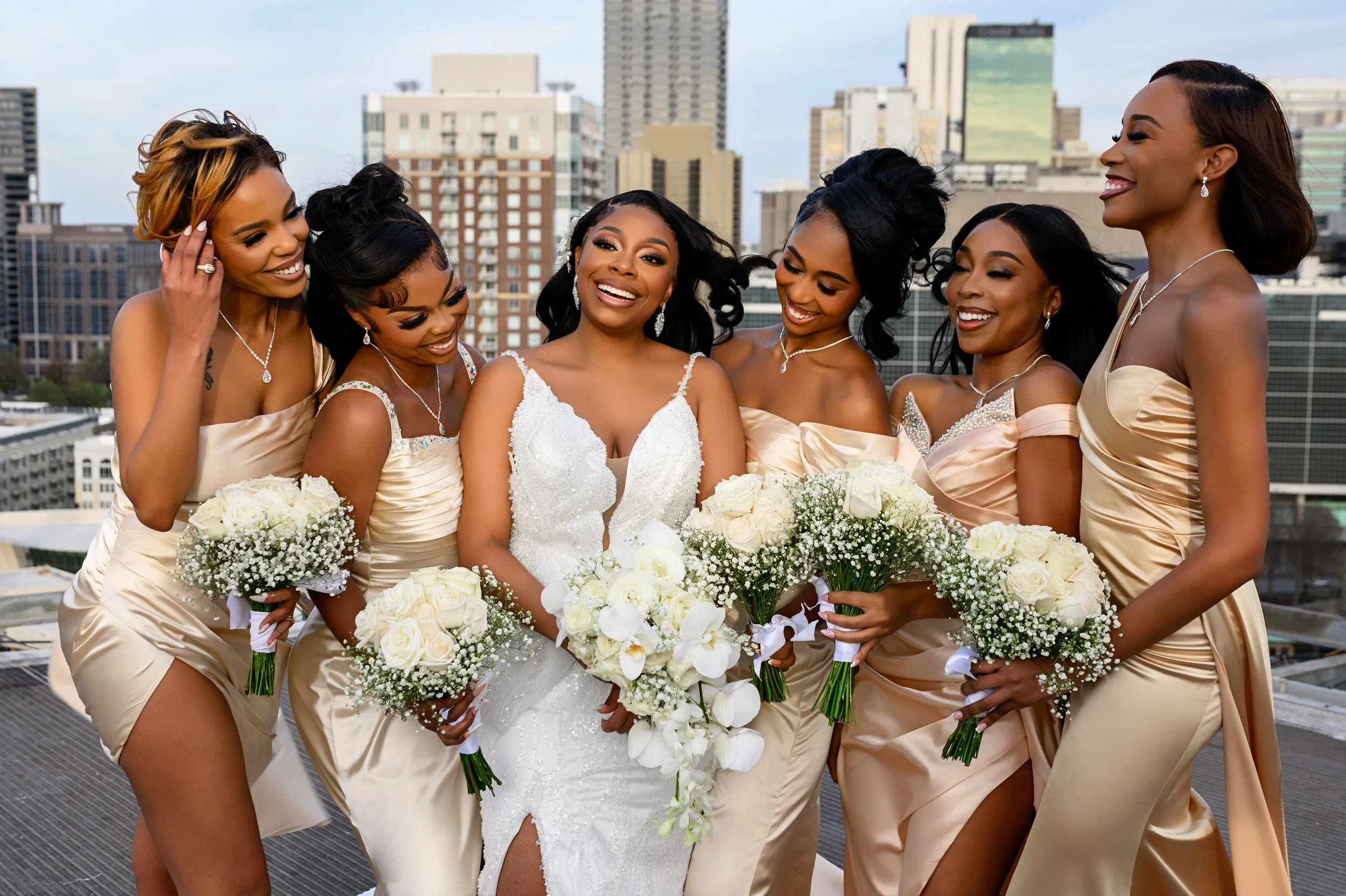 Bride laughing with her bridesmaids during her wedding celebration at Ventanas Atlanta.